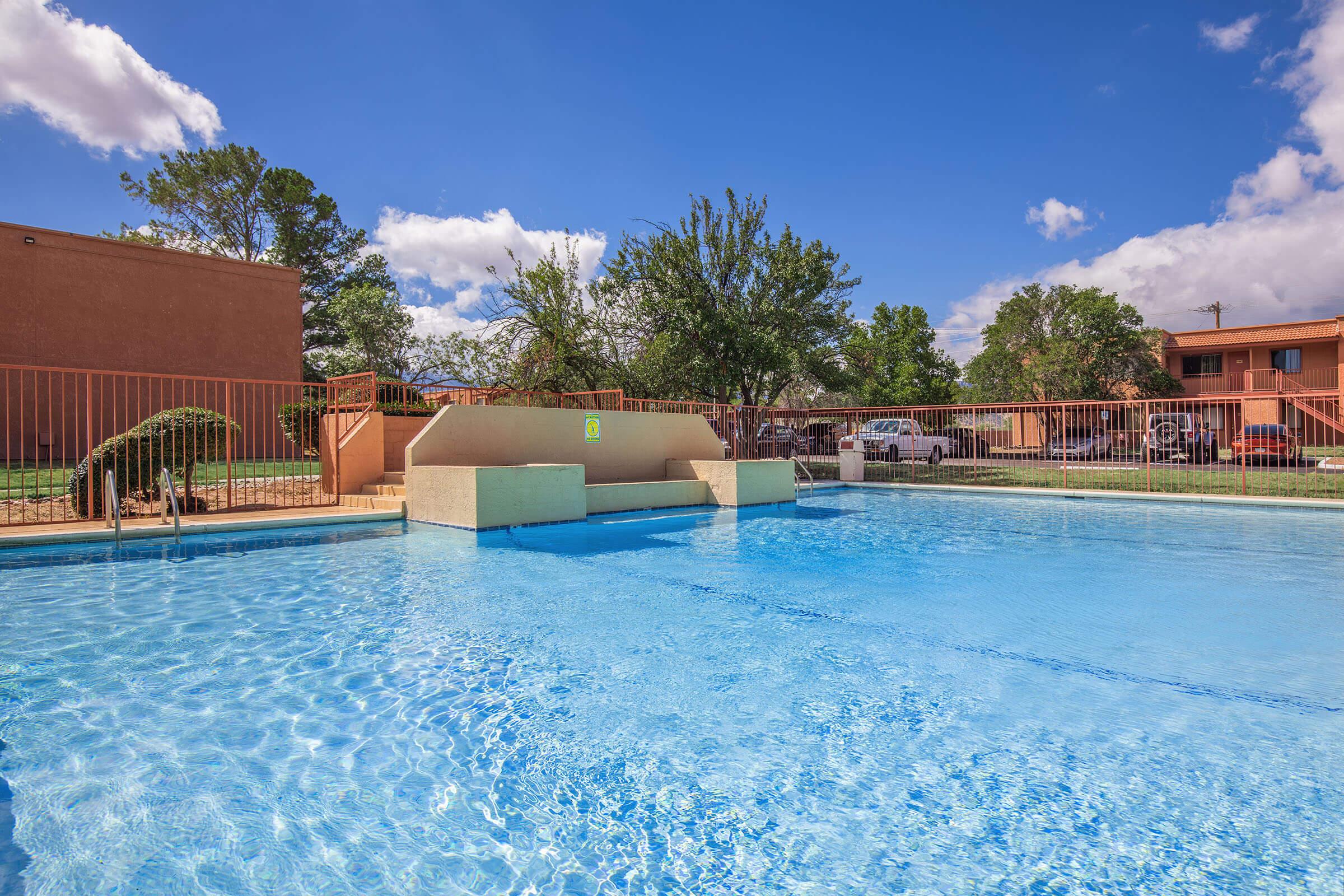 a pool next to a body of water