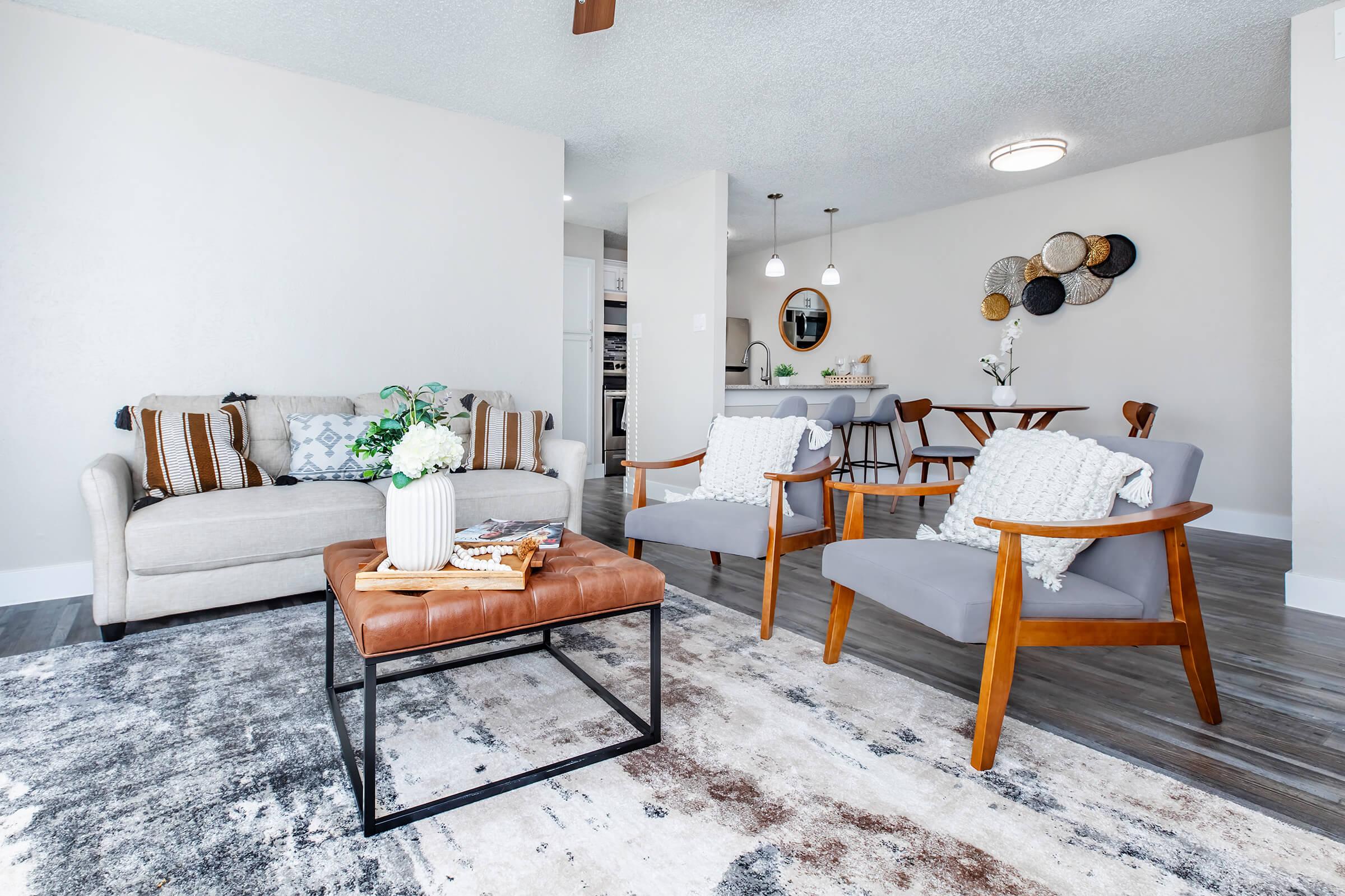 a living room with a couch and a chair