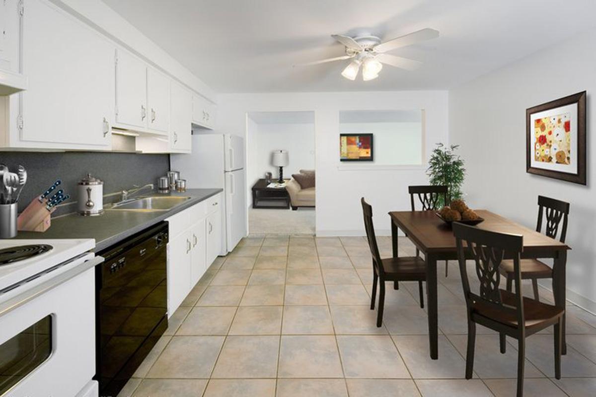 a kitchen with an island in the middle of a room