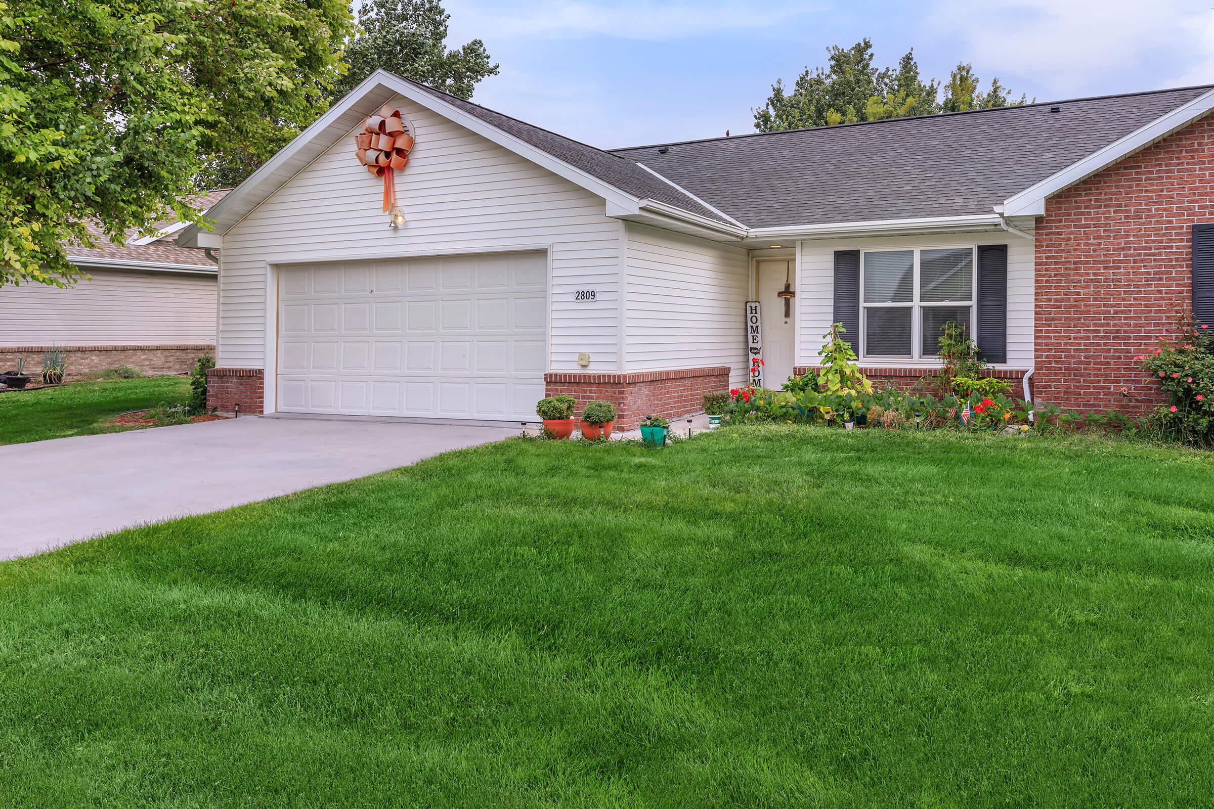 a large lawn in front of a house