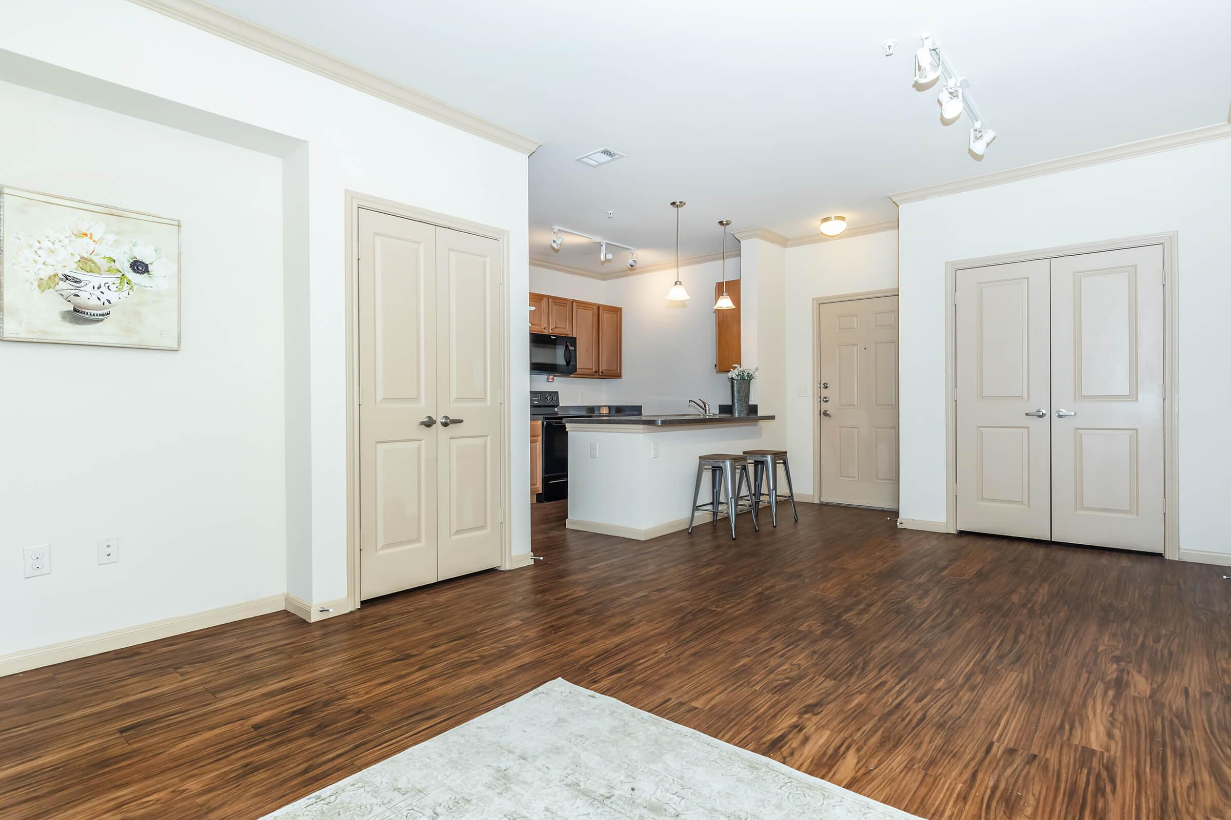 a kitchen with a wooden floor