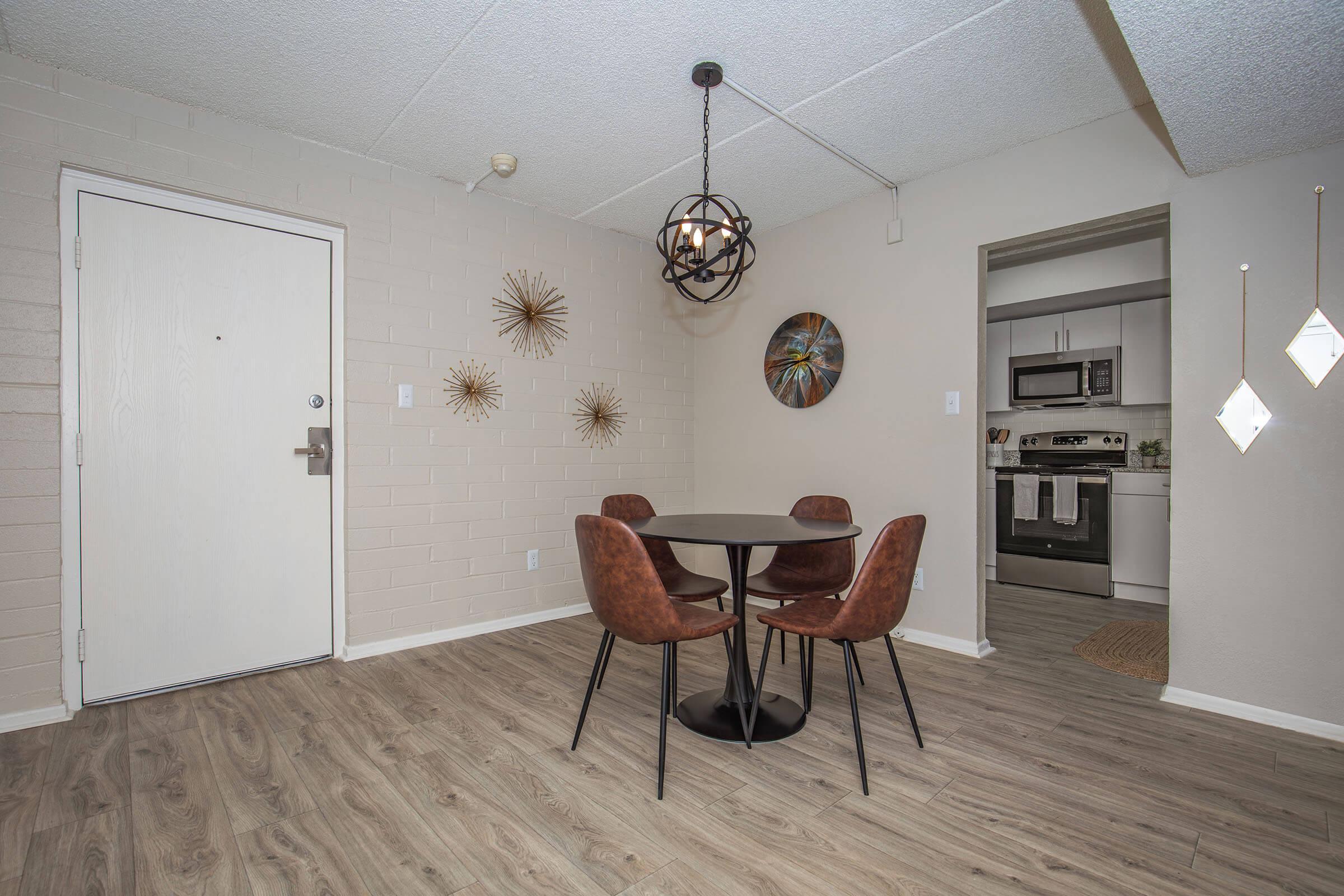 a living room with a wooden floor