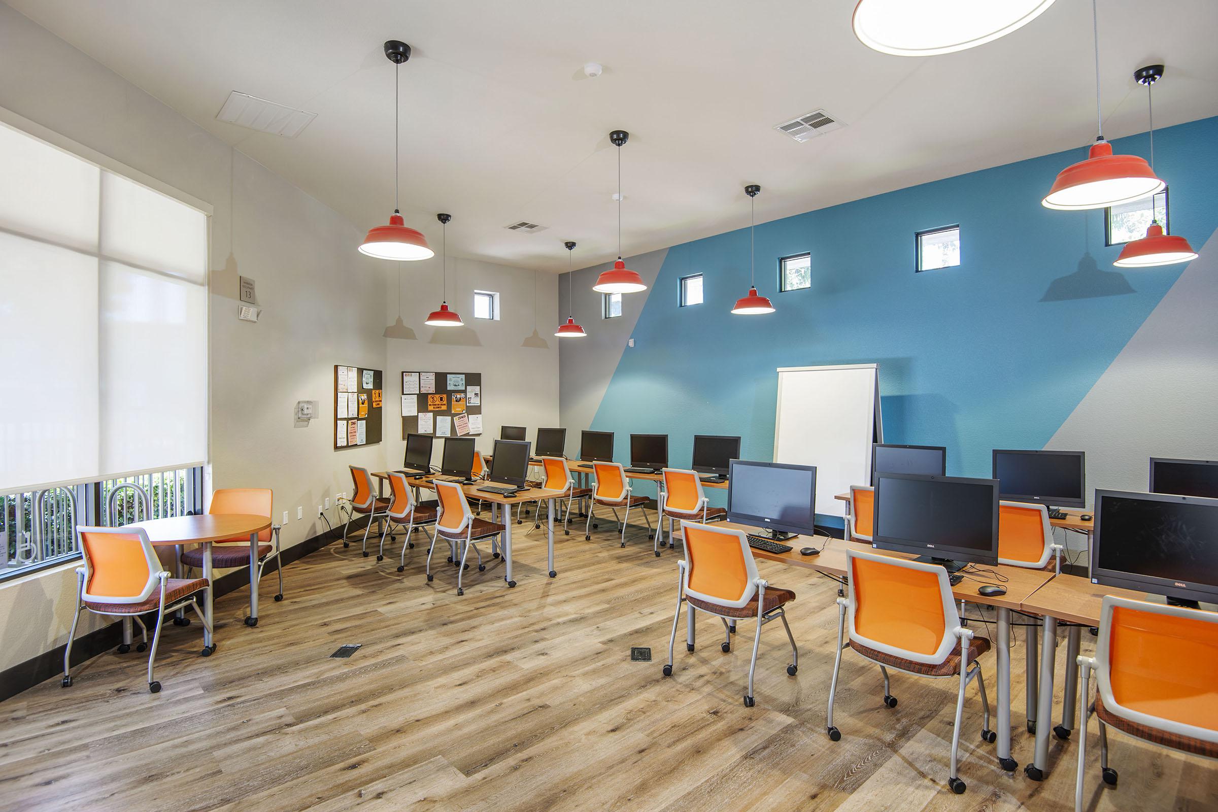 a large orange chair in a room