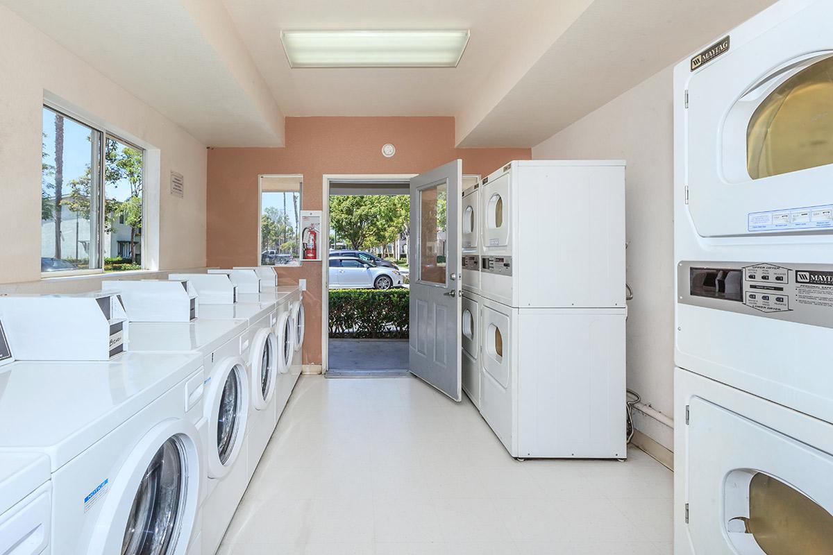 a large white refrigerator in a kitchen