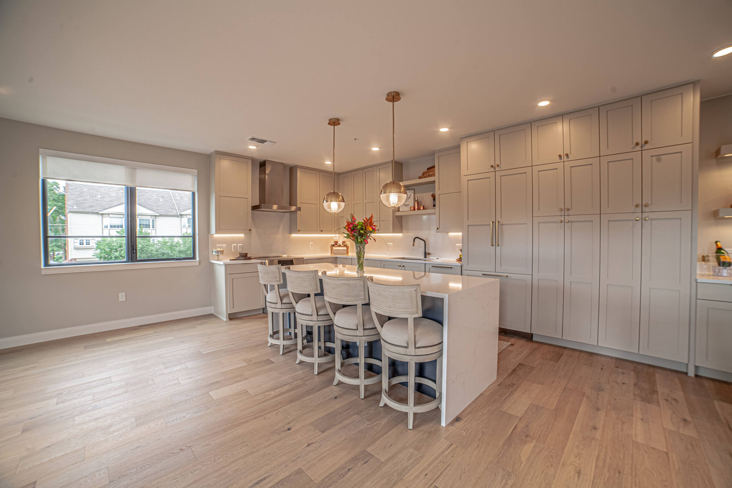 a kitchen with a wood floor