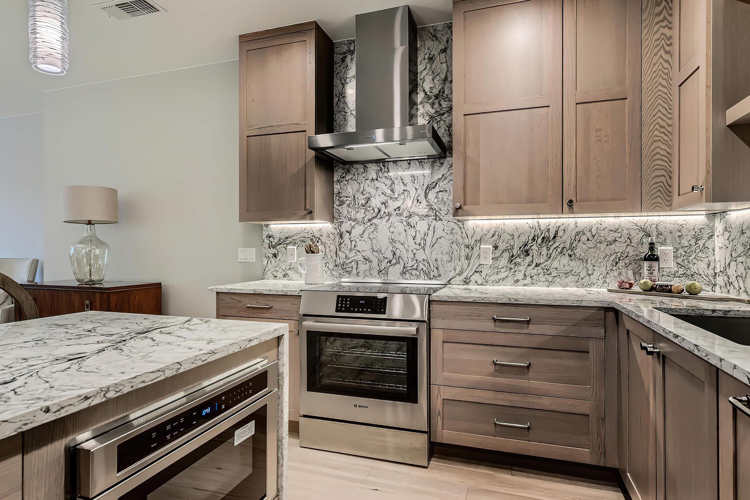 a kitchen with a stove and a sink