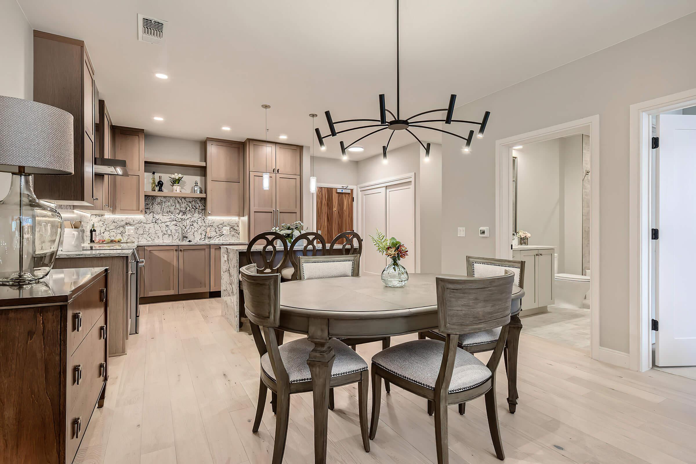 a room filled with furniture and a table