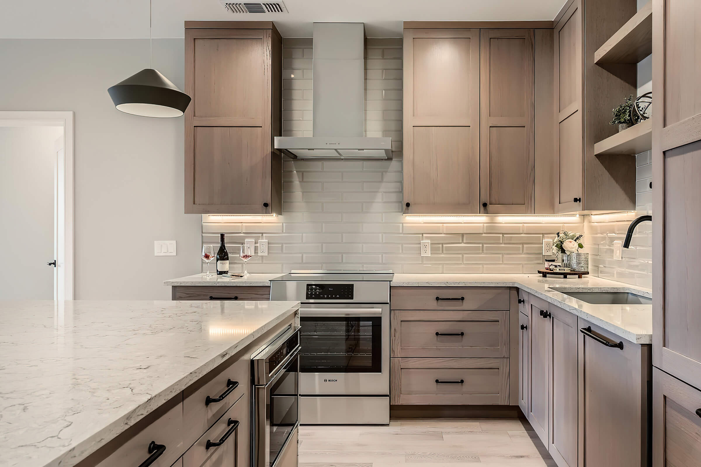 a kitchen with a stove and a sink