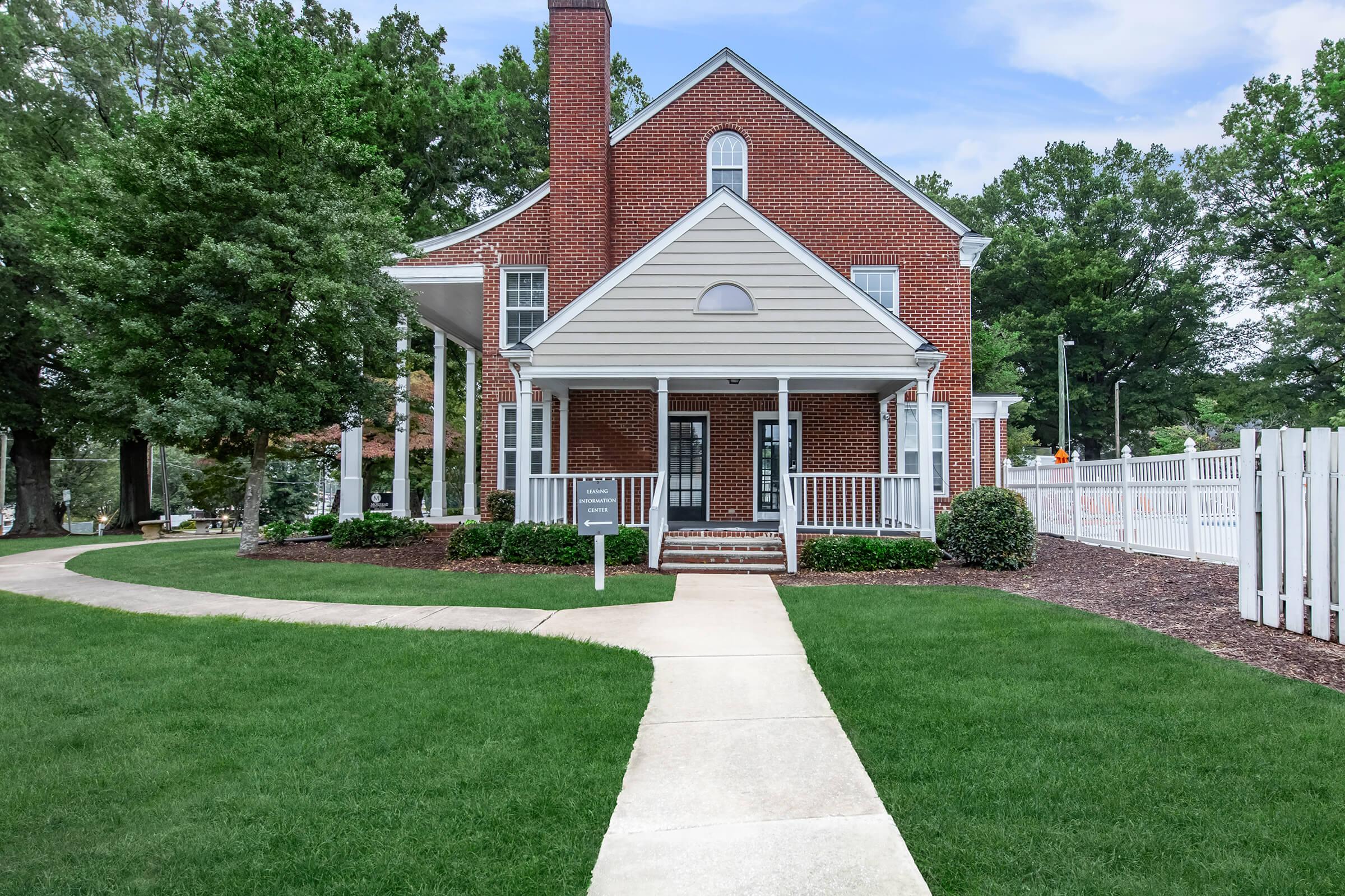 a large lawn in front of a house