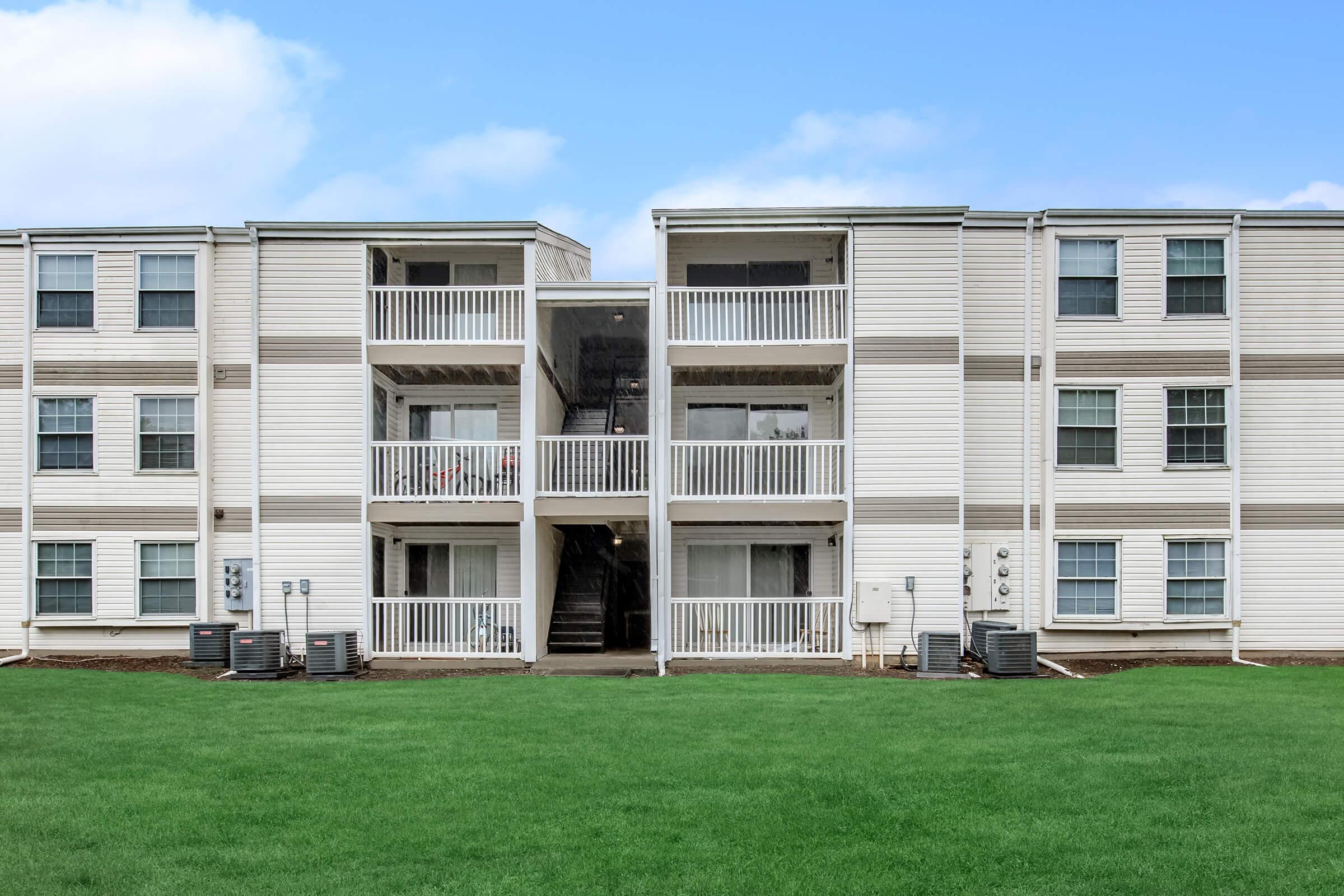 a large lawn in front of a building