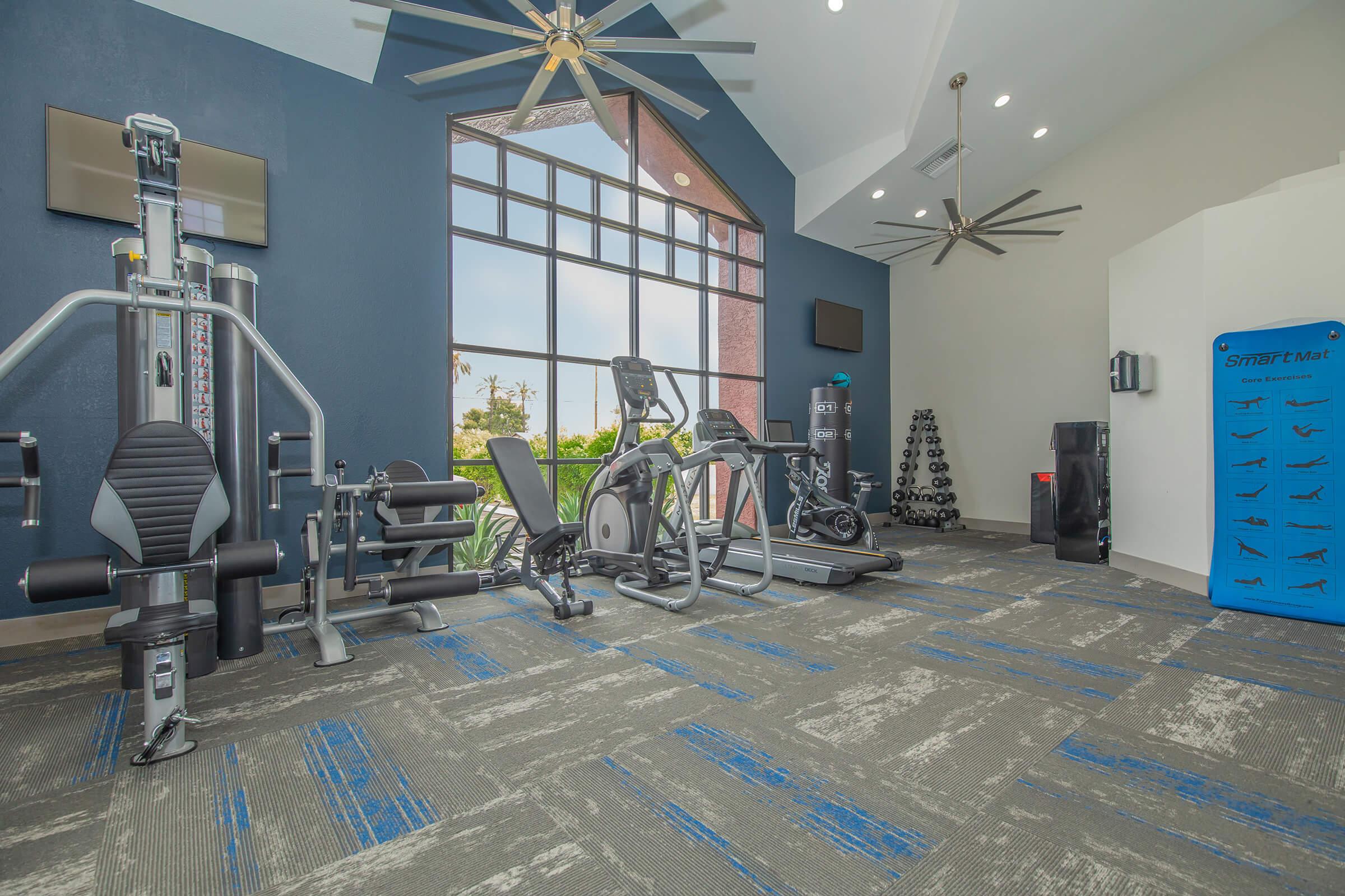 Indoor modern fitness center with new gym equipment