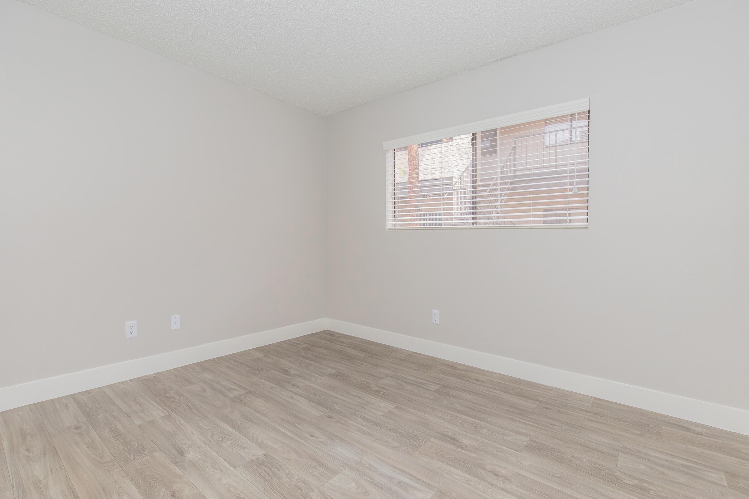 Modern clean bedroom space with window