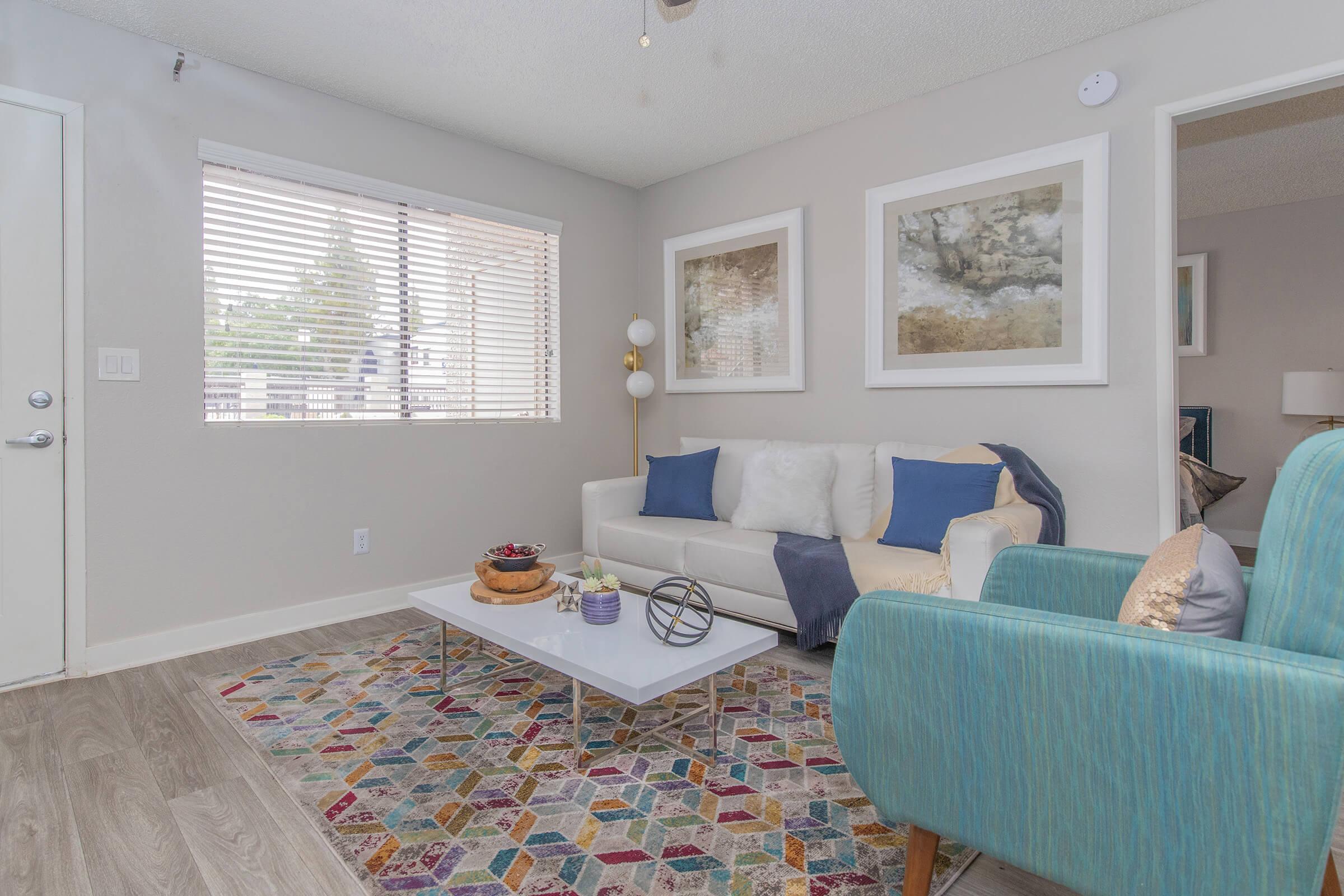 Fresh modern and colorful living room with large window