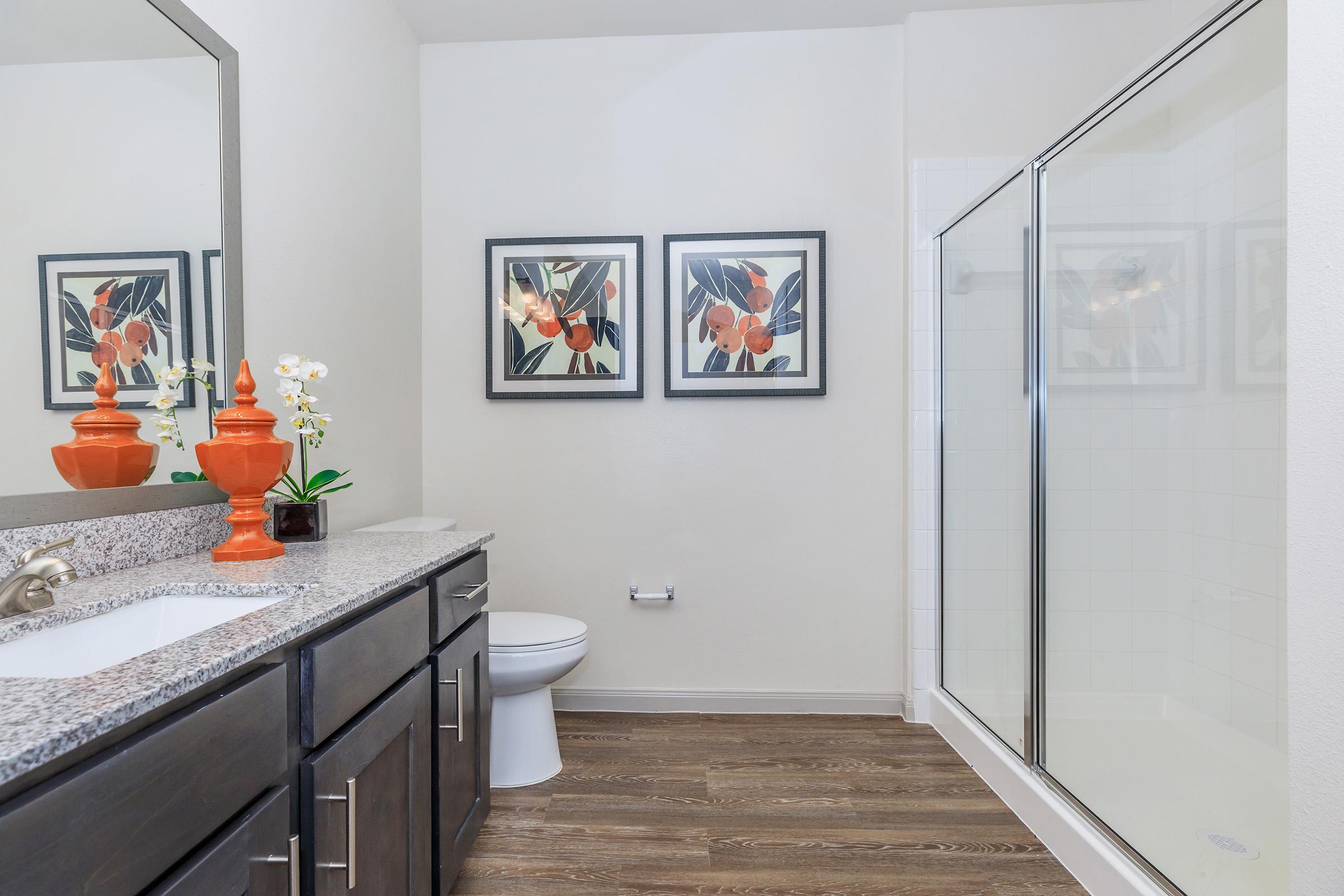 a room with a sink and a mirror