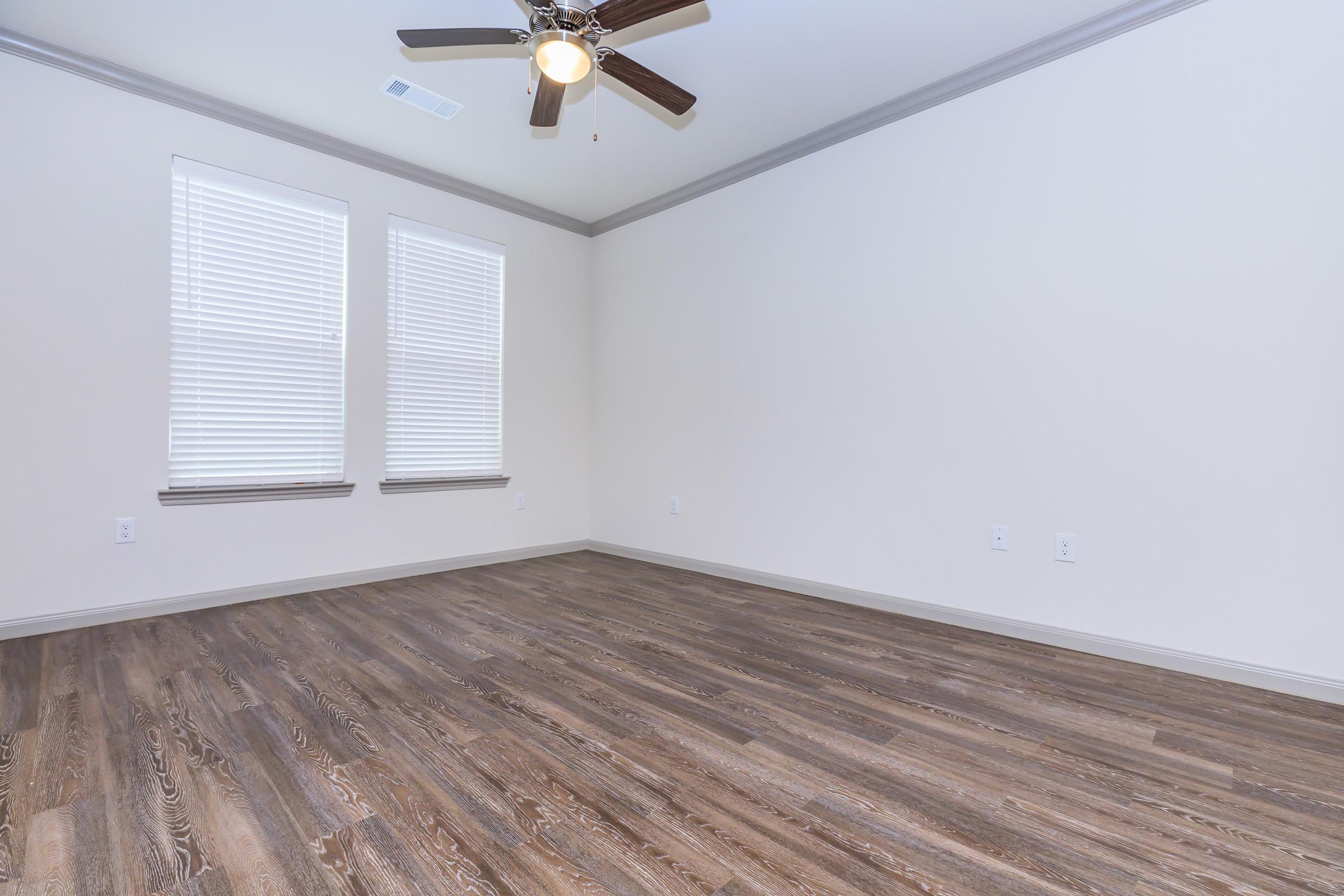 SPACIOUS LIVING ROOM AT THE RETREAT AT BARBERS HILL