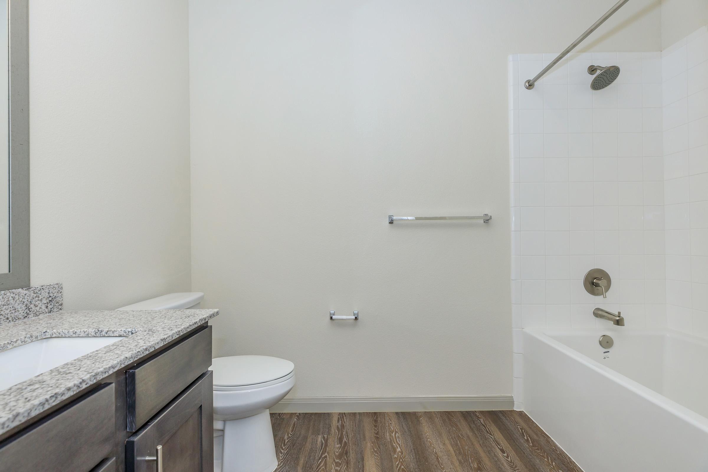 a room with a sink and a mirror