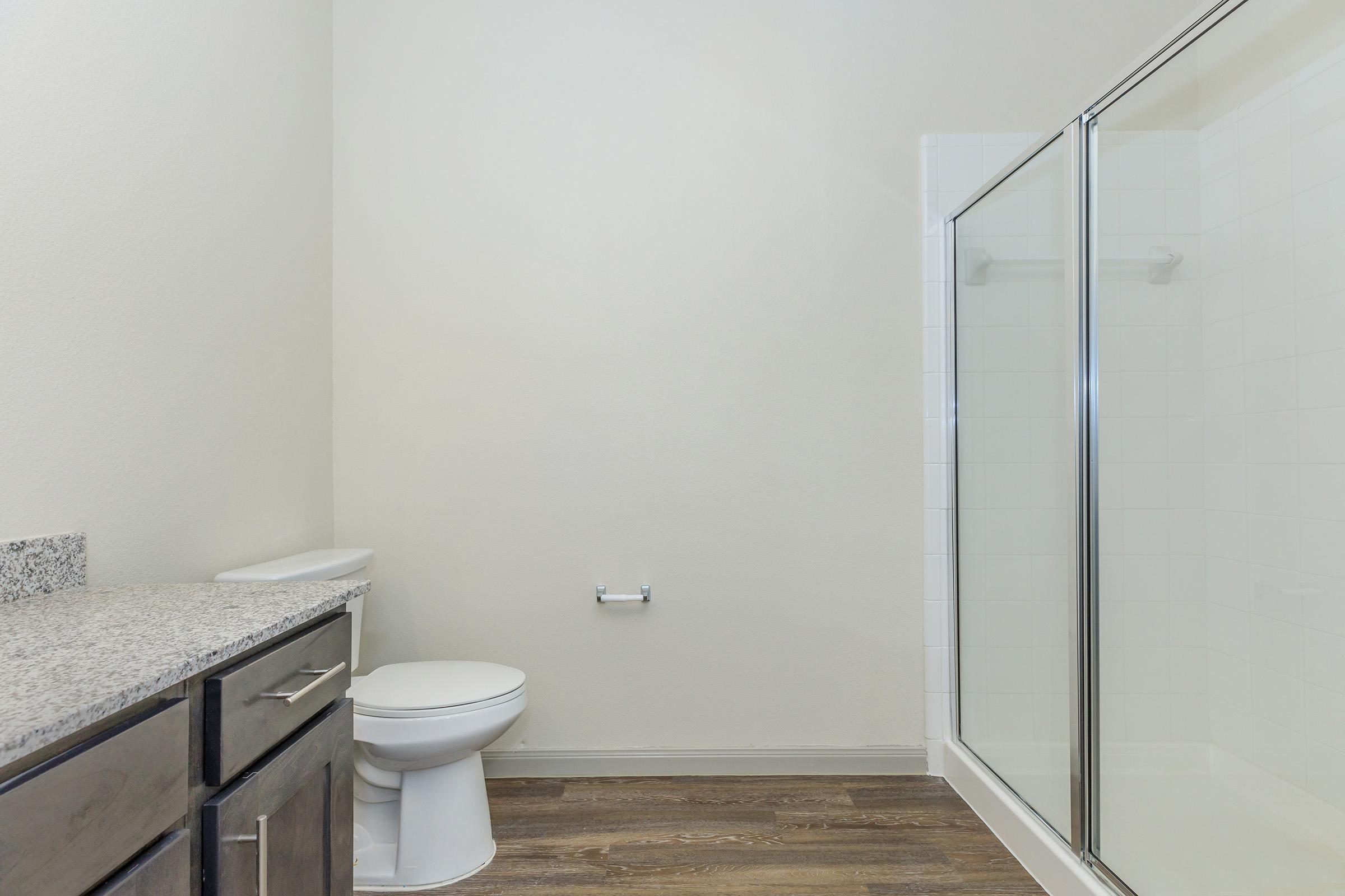 a room with a sink and a mirror