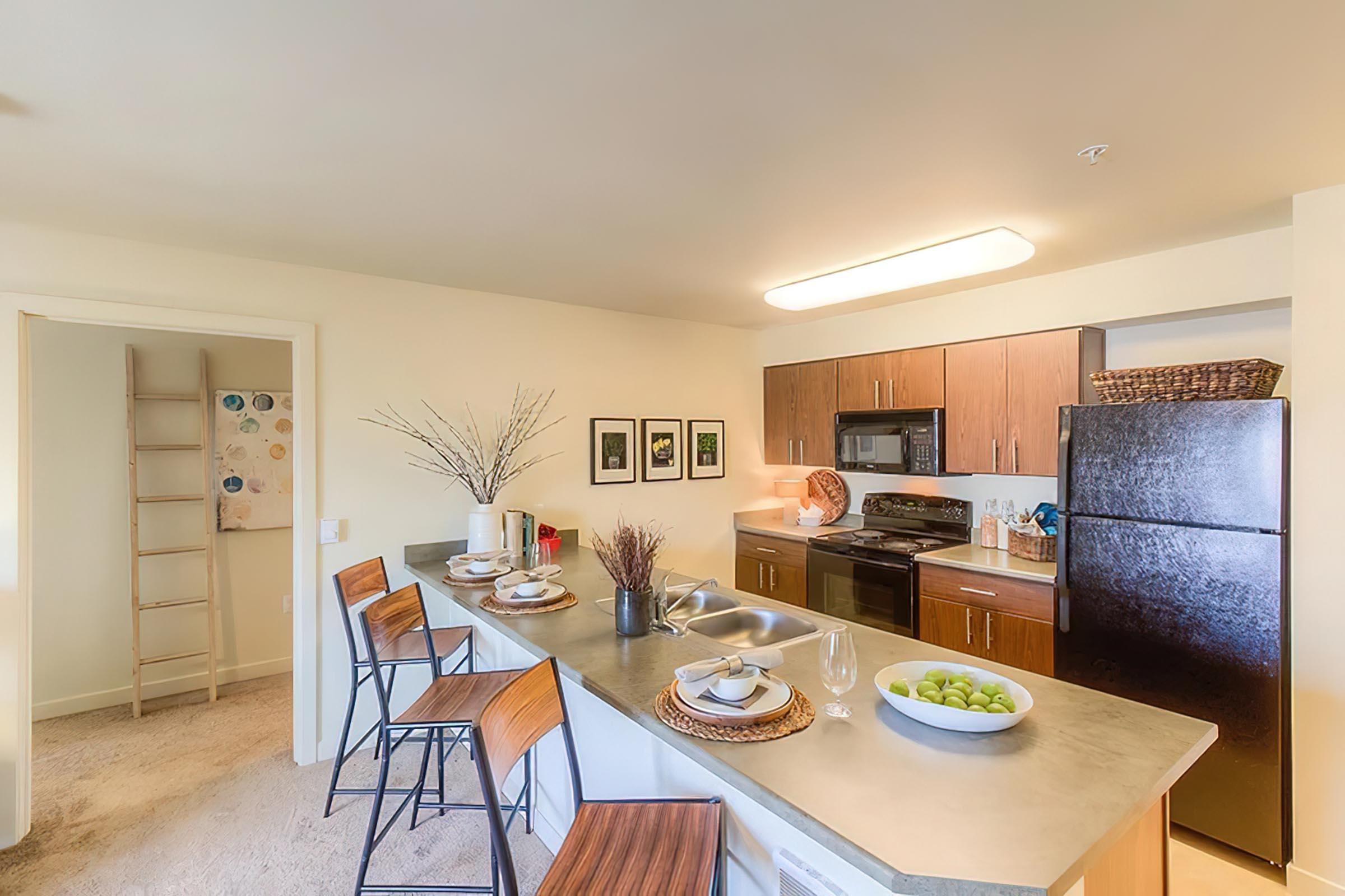 a kitchen with a dining table