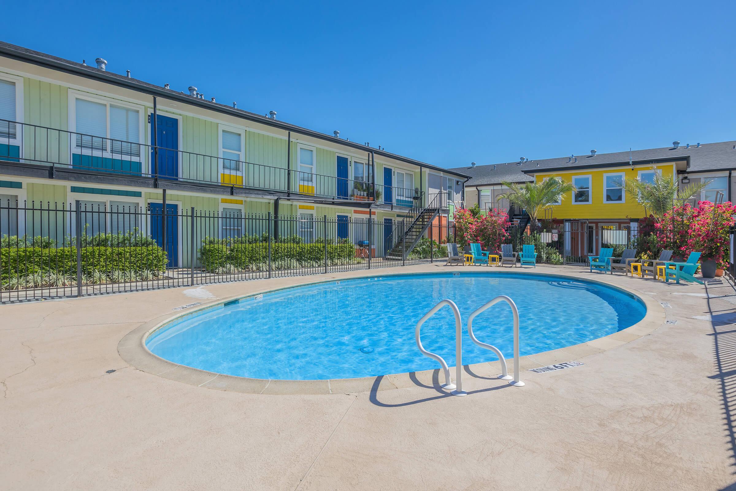 a pool next to a building