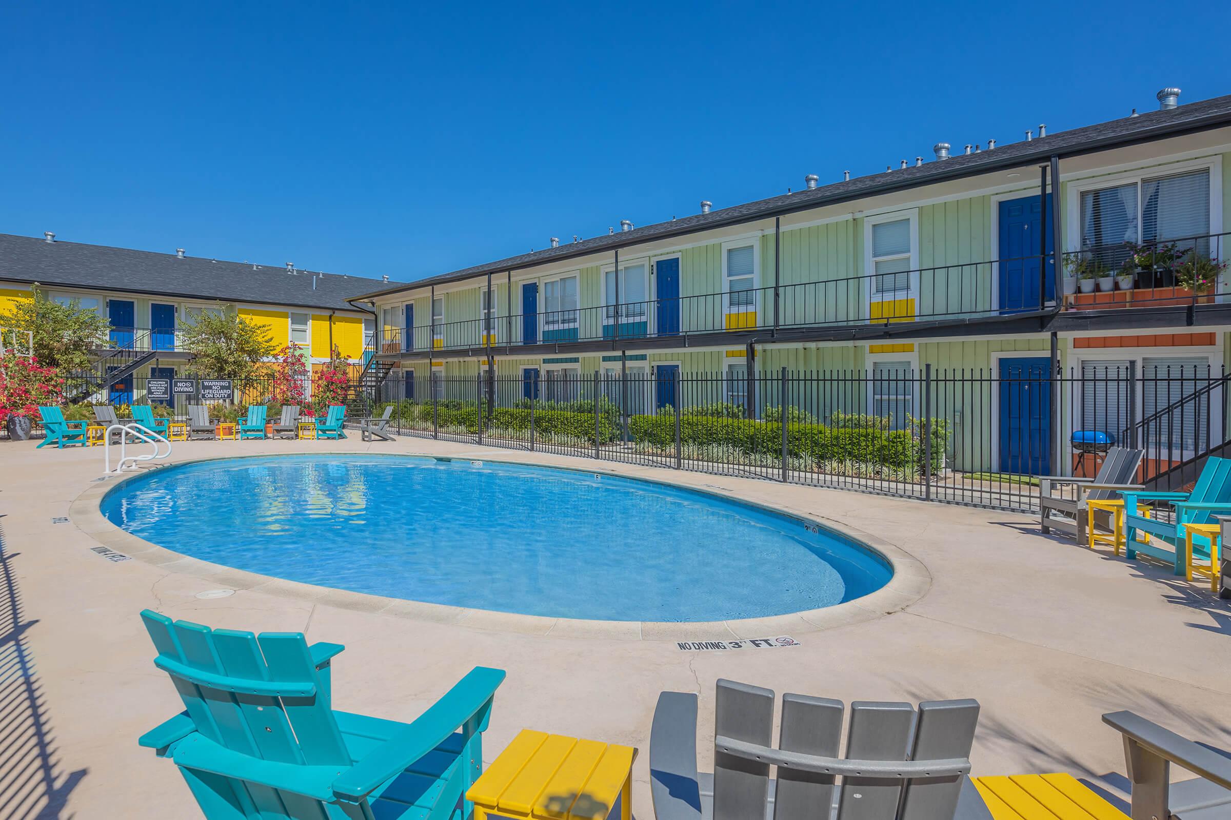 a pool next to a building