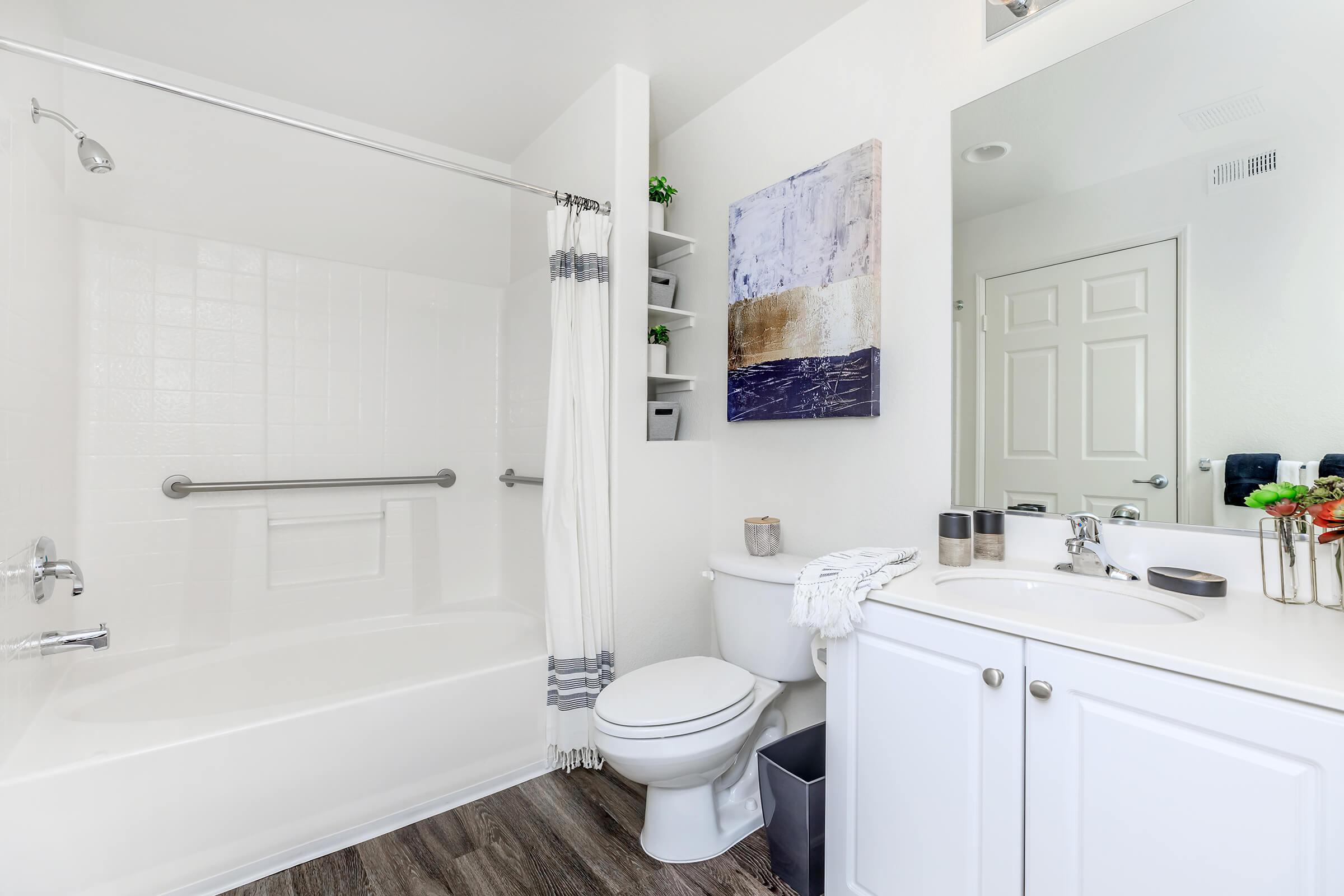 Bathroom with white shower curtain