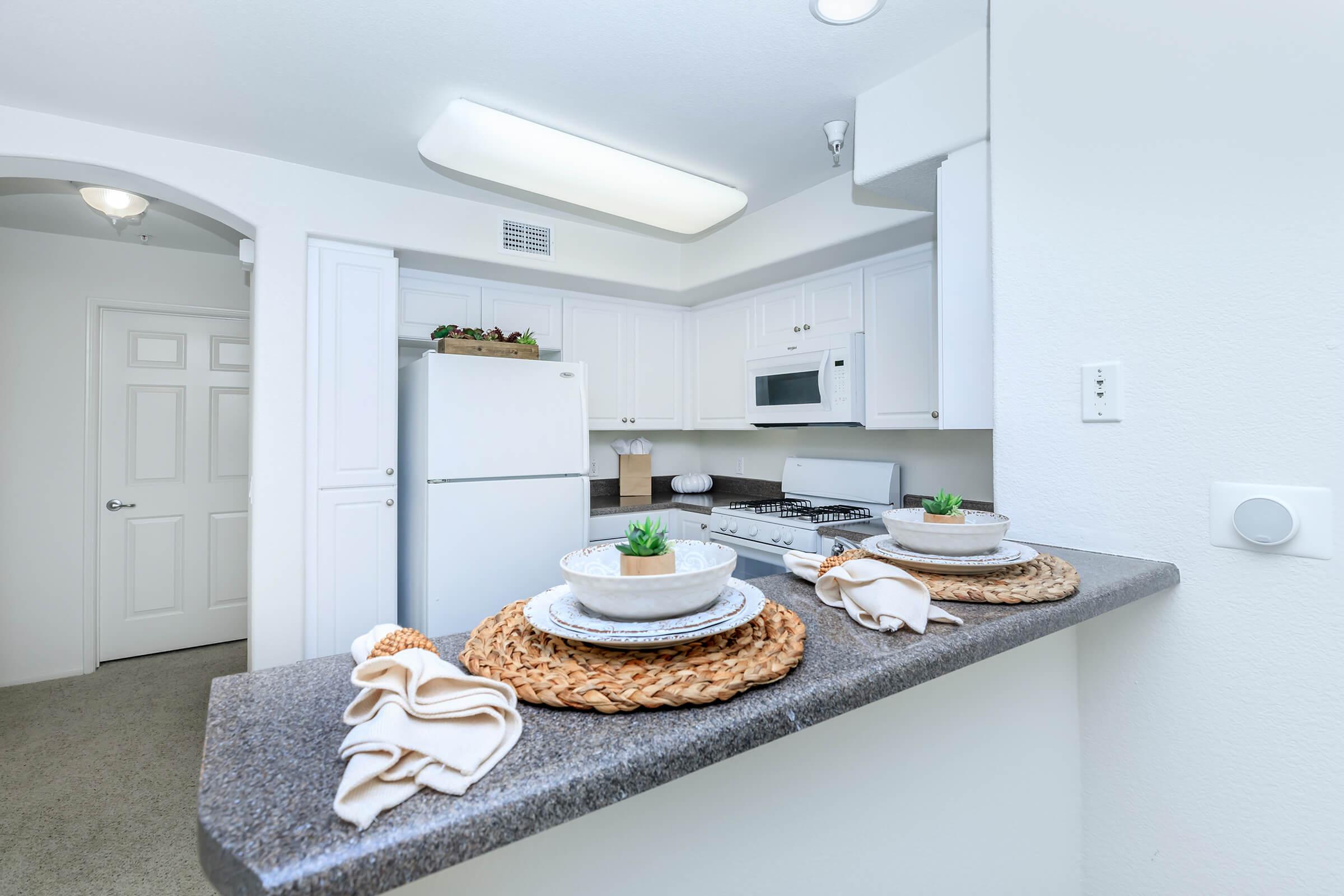 Kitchen counter with white bowls