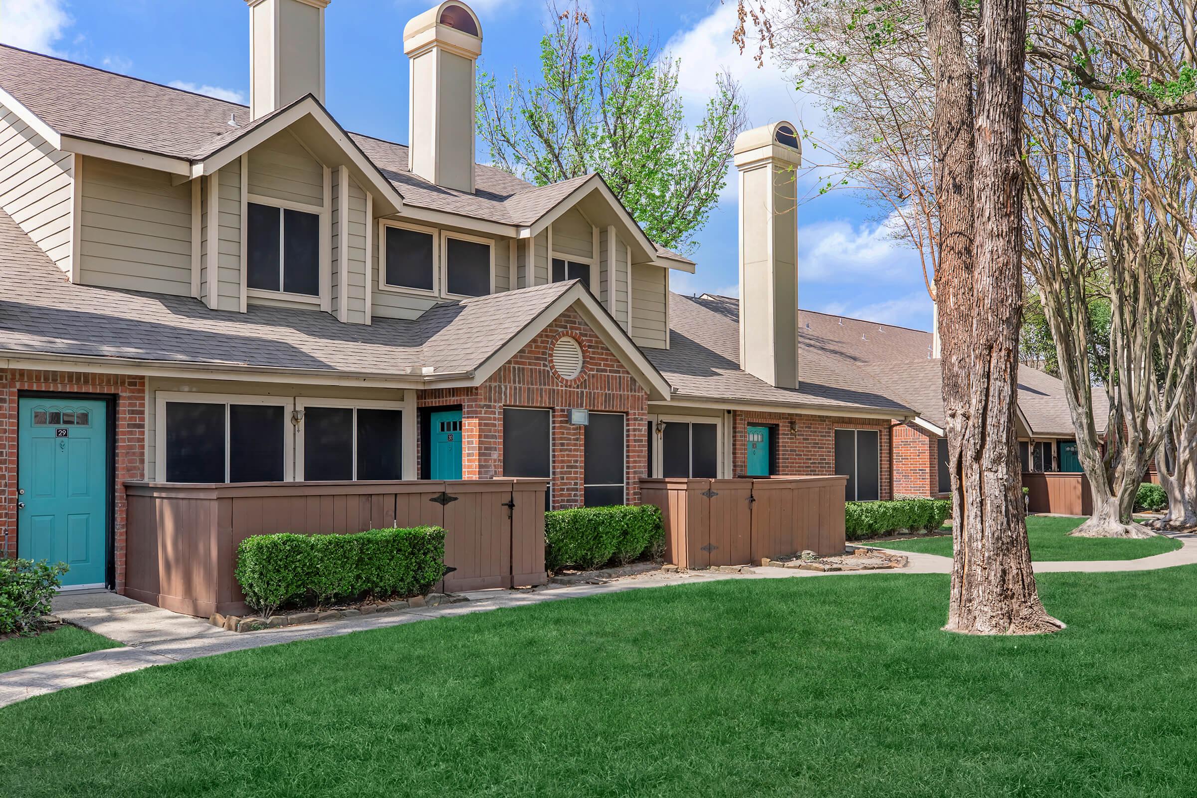 a large lawn in front of a house