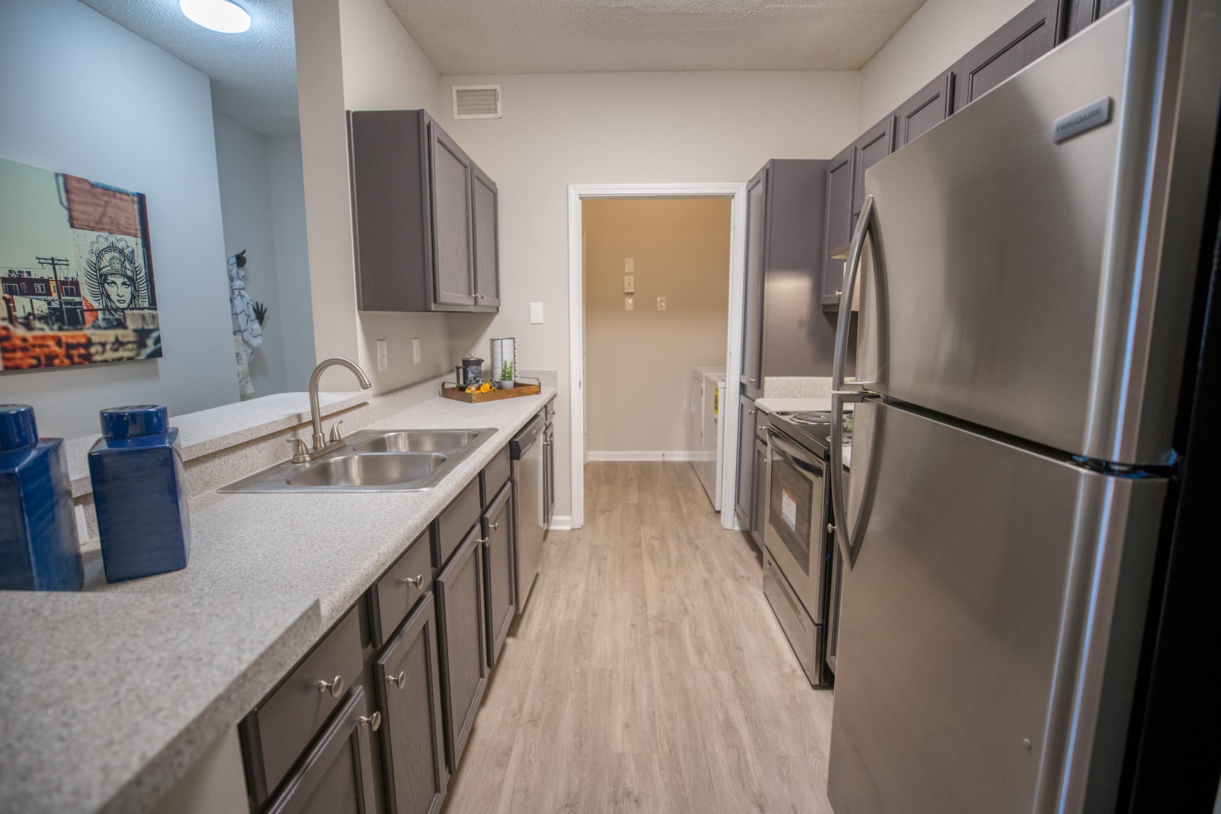 a stainless steel refrigerator in a kitchen