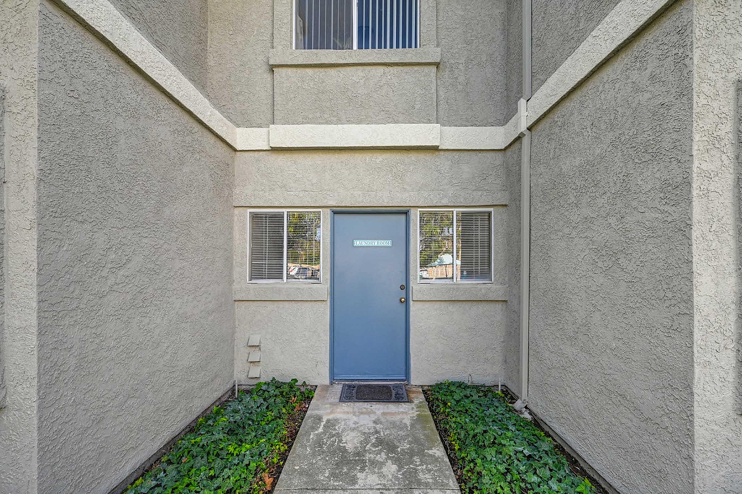 a building with a blue door