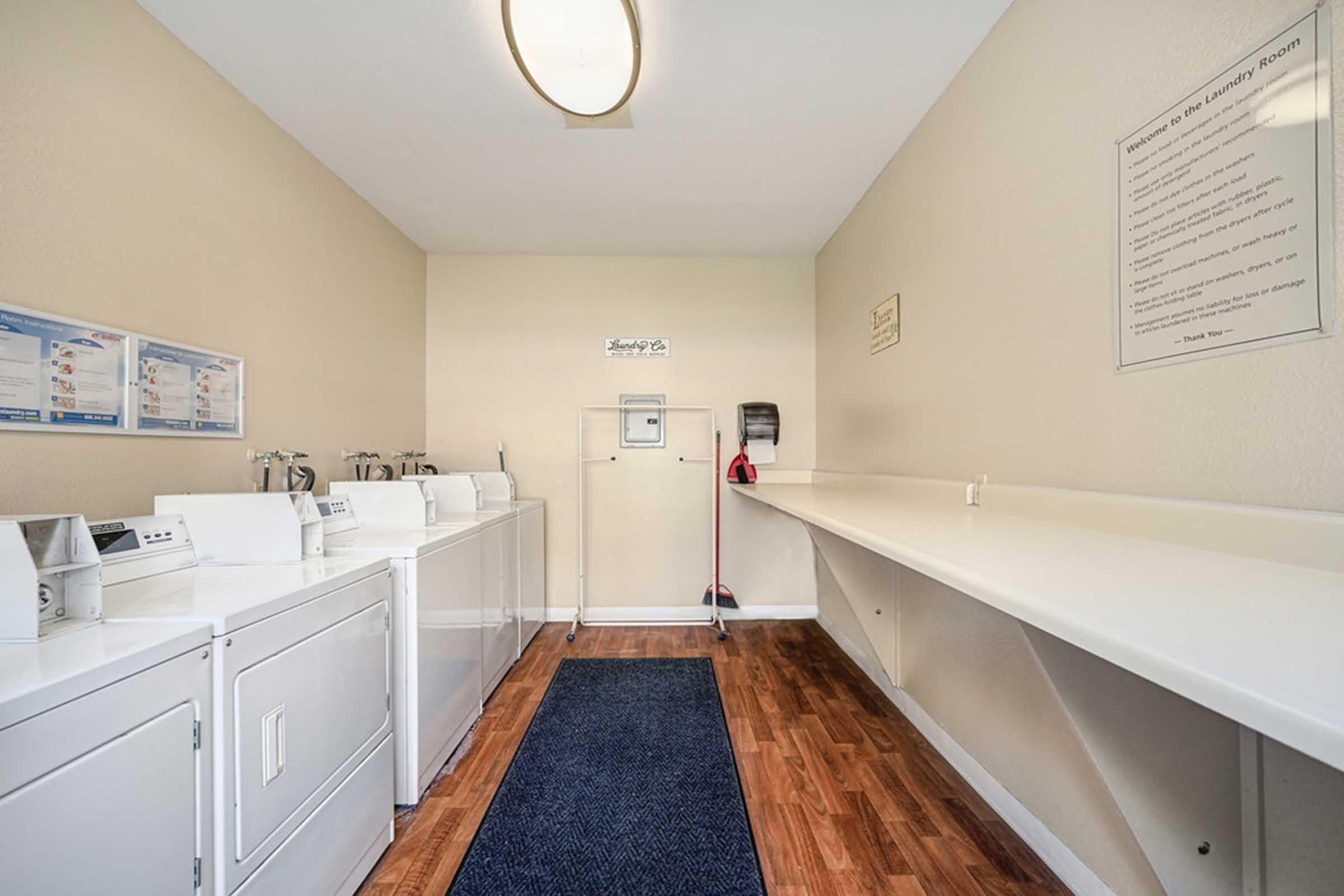 a laundry room with machines