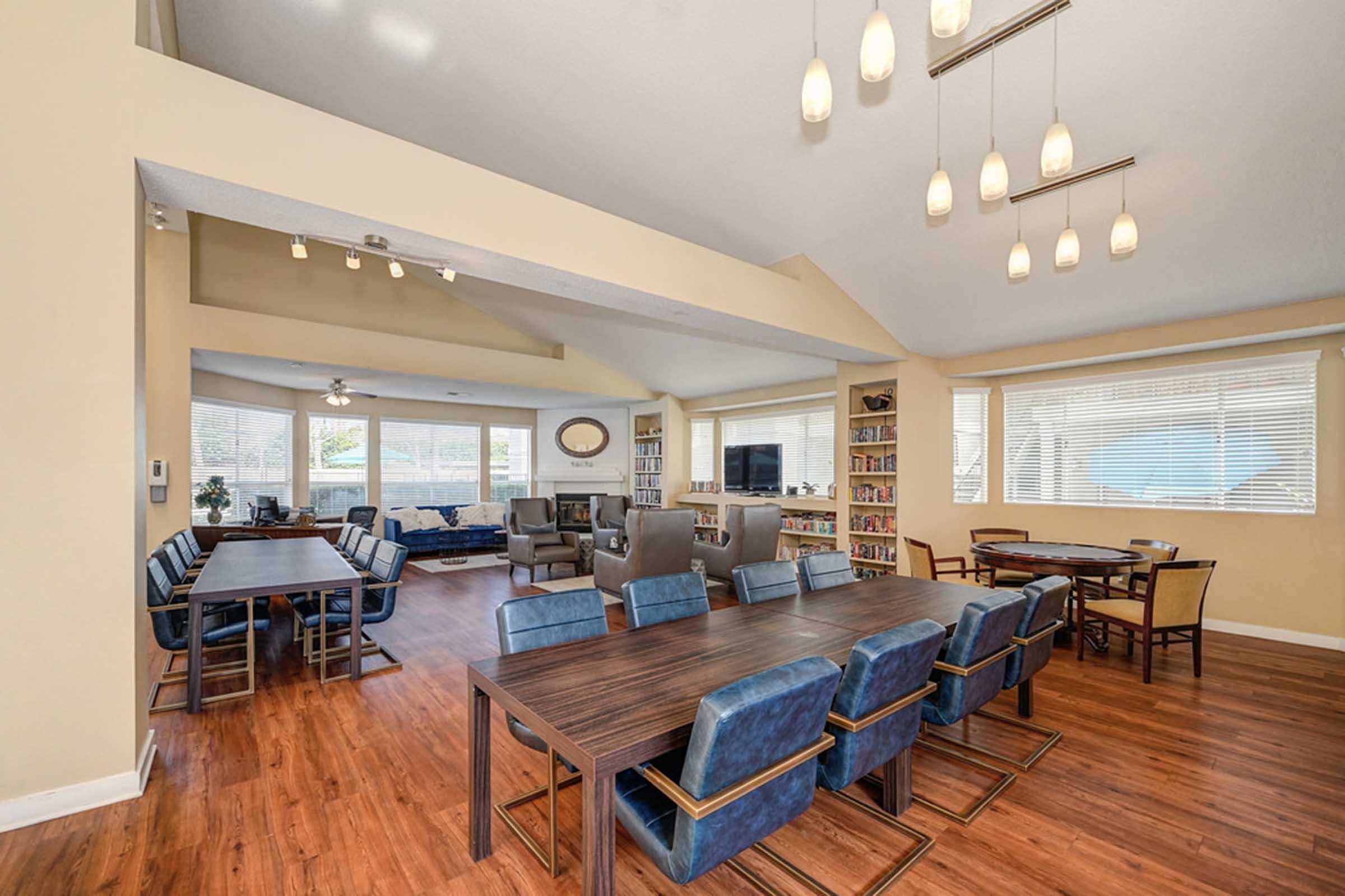 a room filled with furniture and a conference table