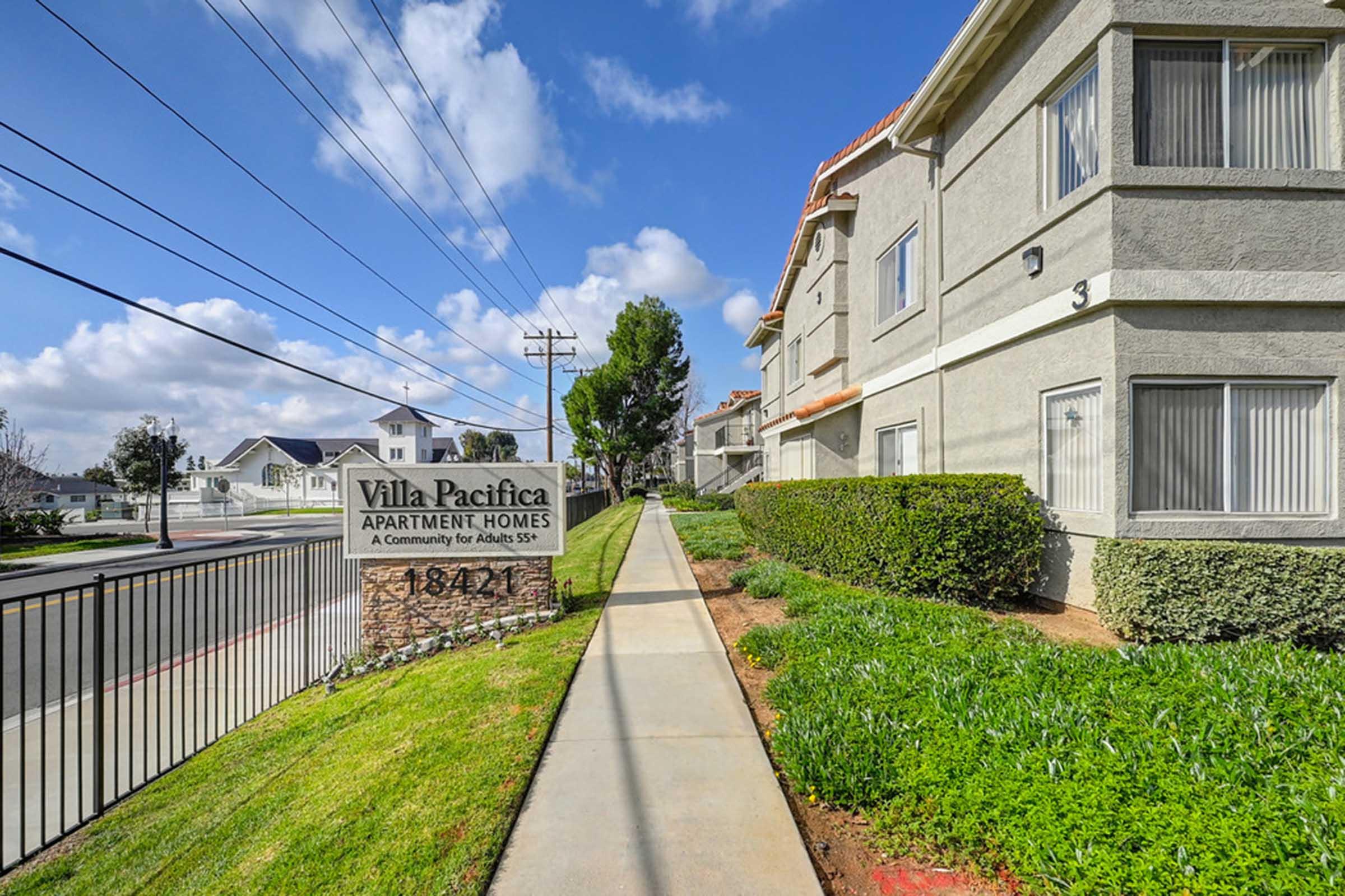 a walkway next to a building