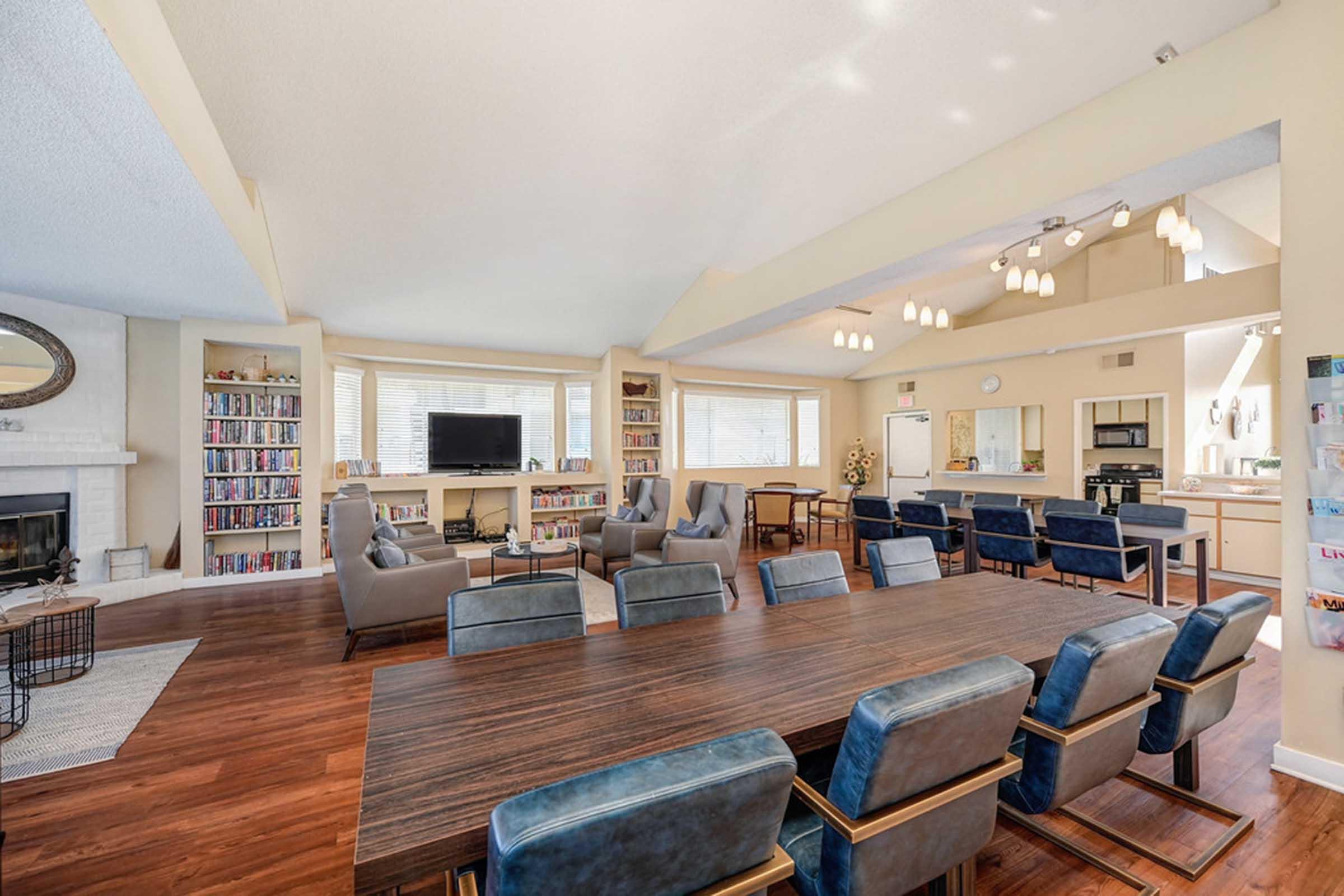 a large conference table with chairs