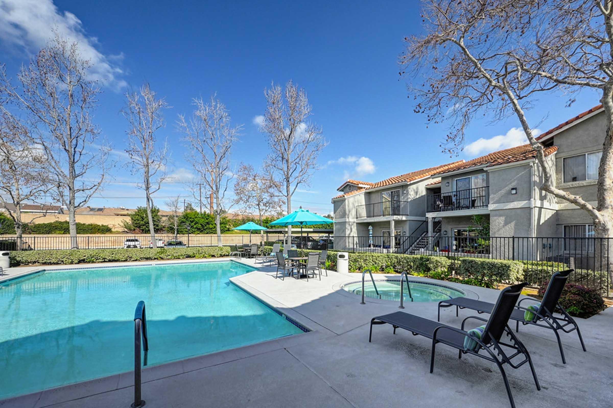 a pool in front of a building