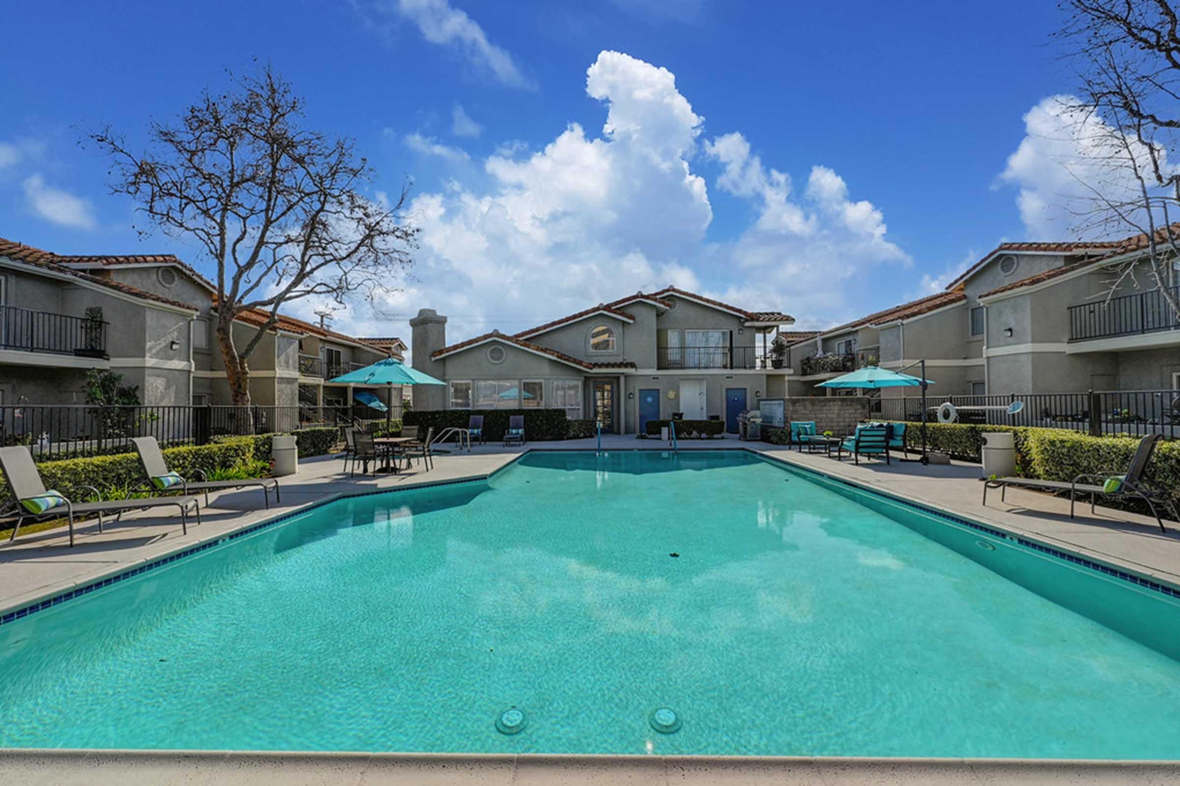 a view of a pool next to a building