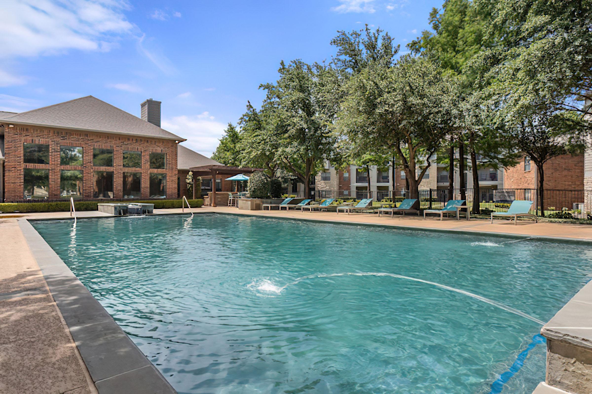 a house with a large pool of water