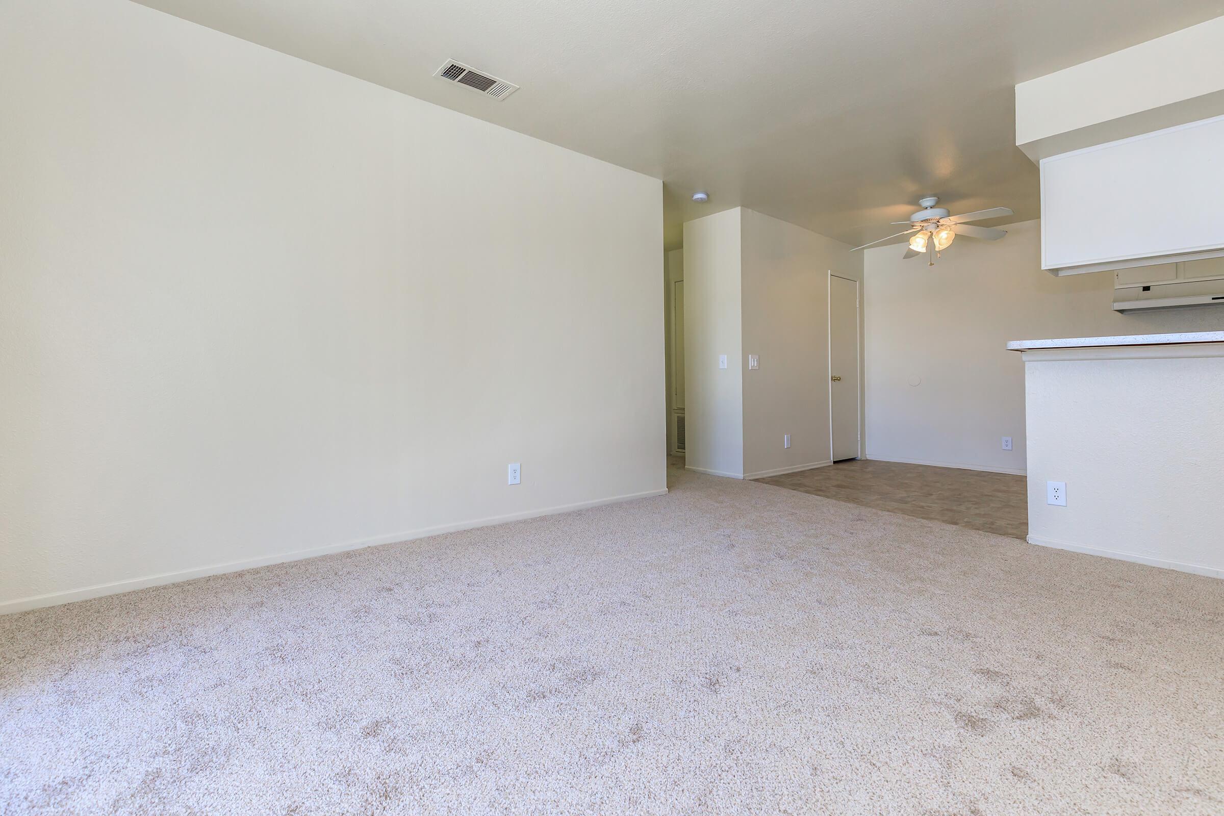 Dining room and kitchen with tile flooring