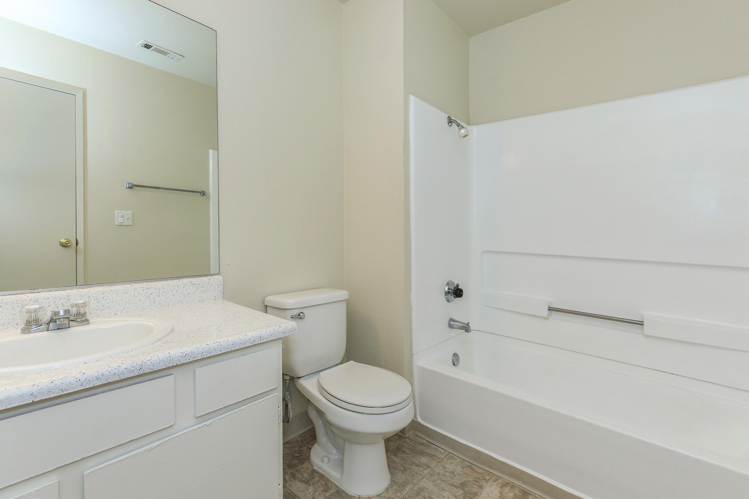 Bathroom with white cabinets