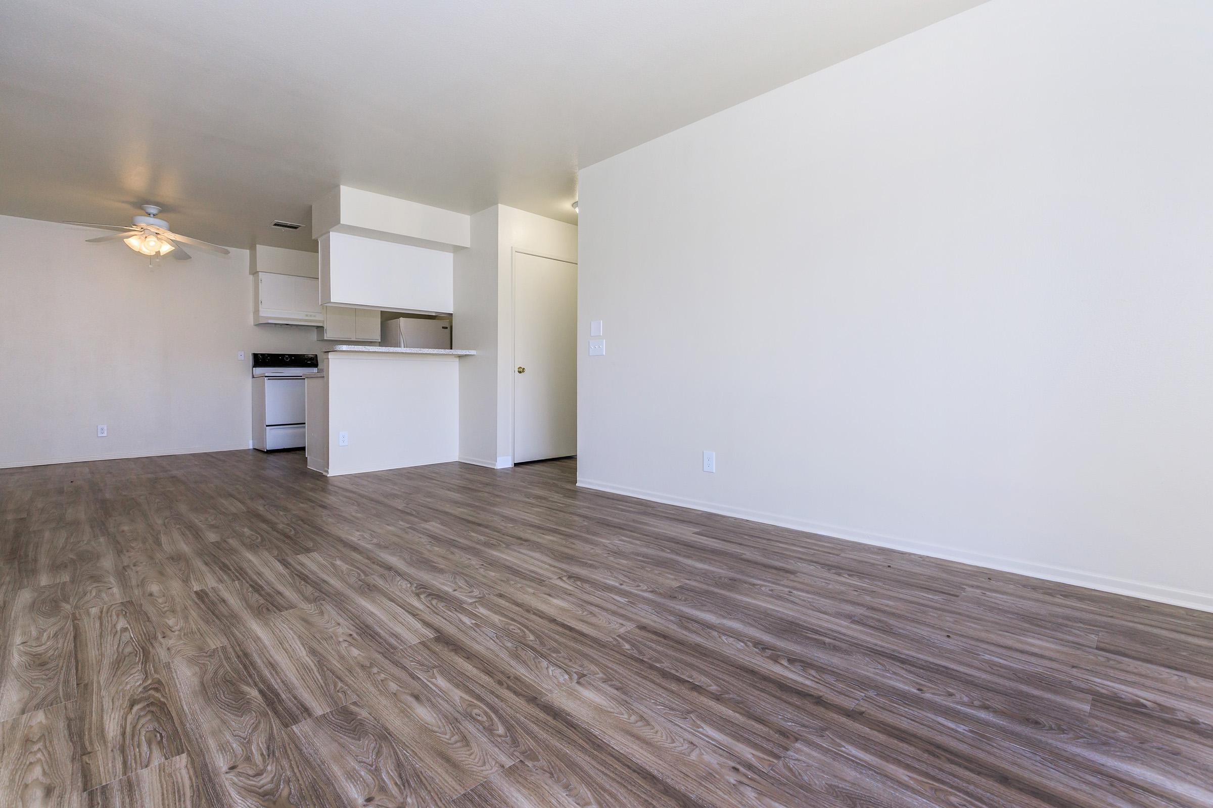 Dining room and living room with wooden floors