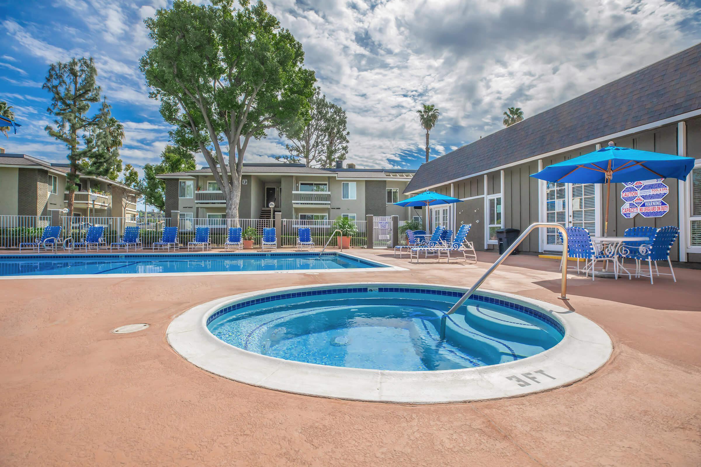 a pool in front of a building