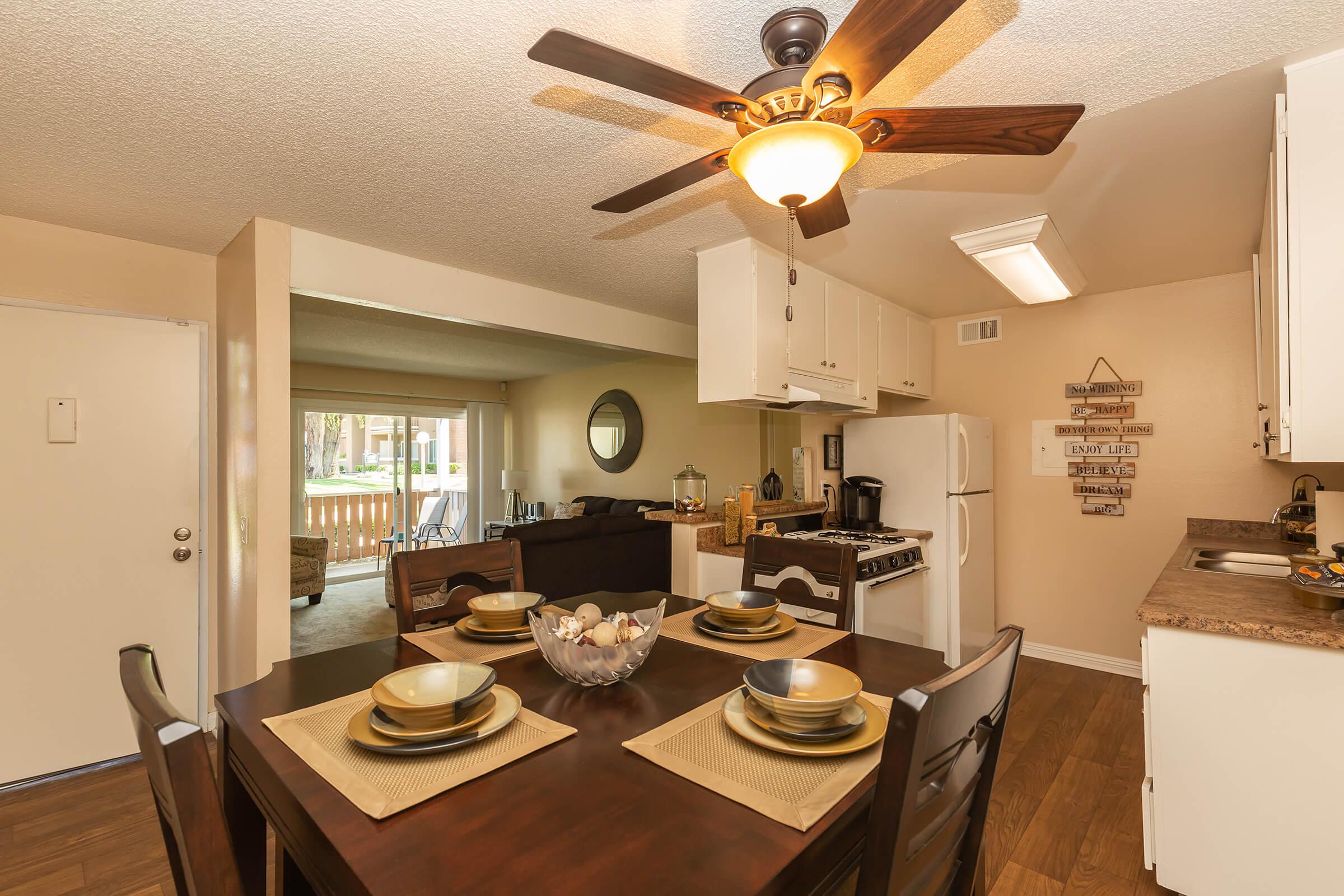 a kitchen with a dining room table