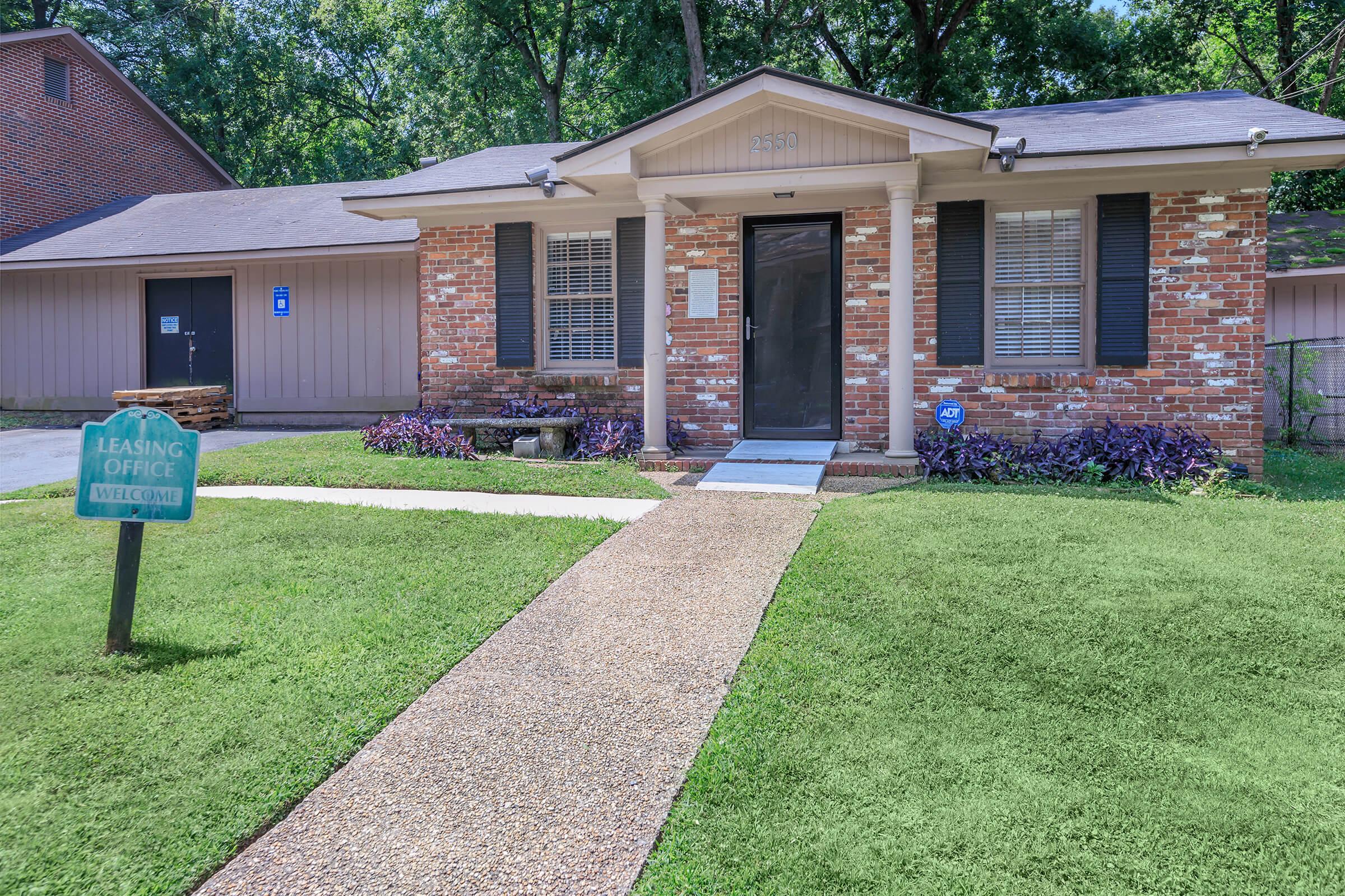 a large lawn in front of a house