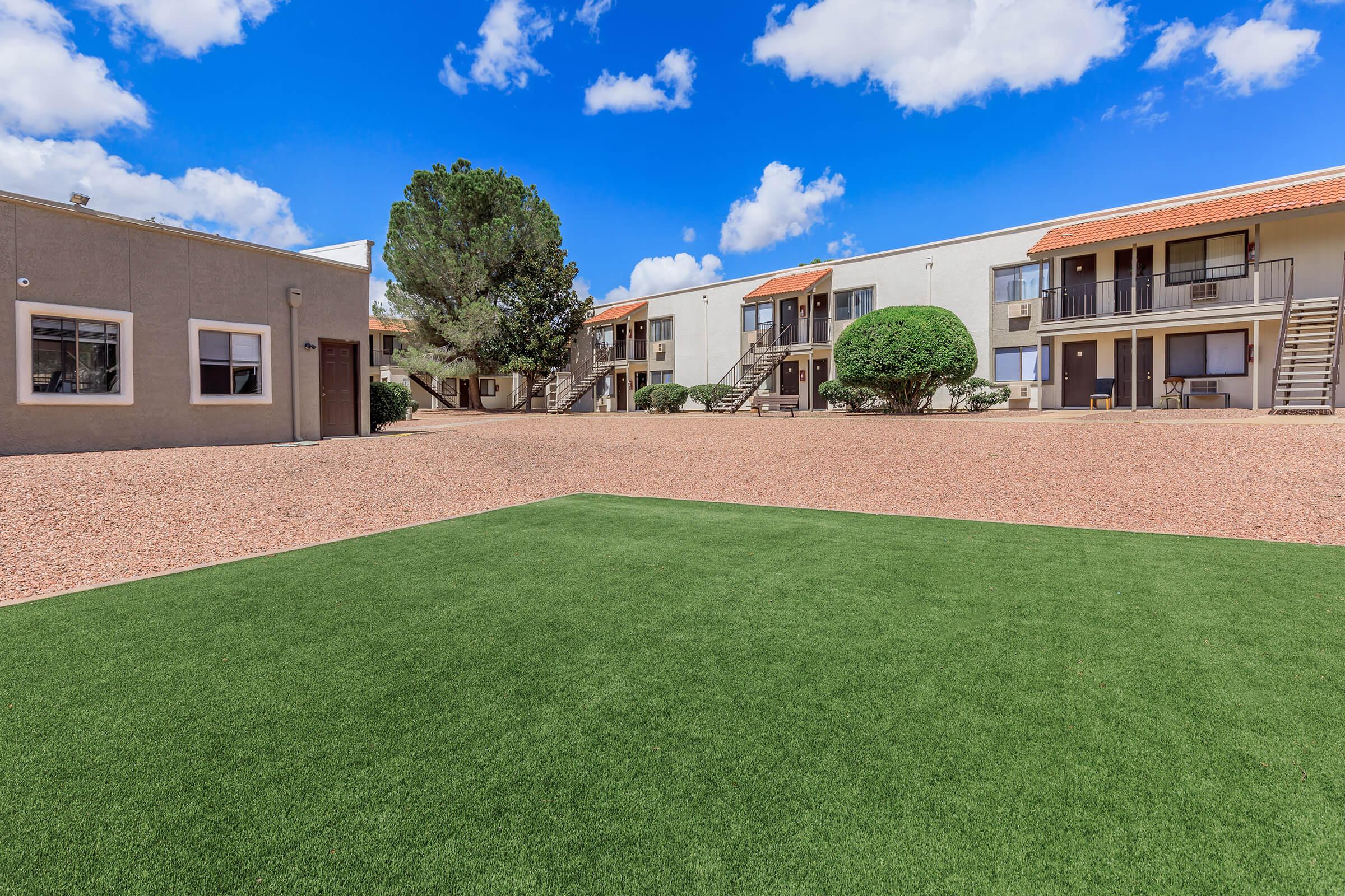 a large lawn in front of a house