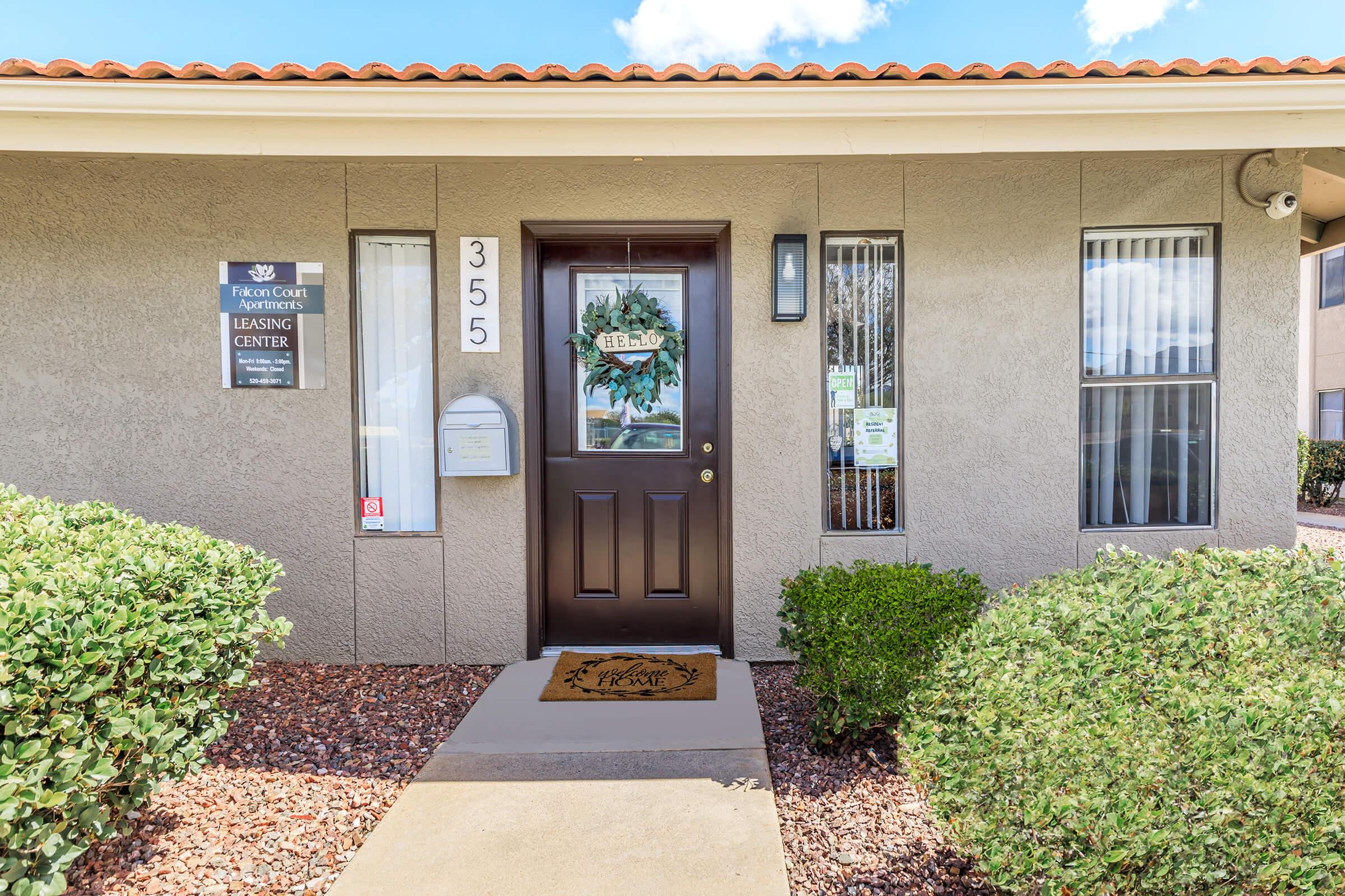 a house that has a sign on the side of a building