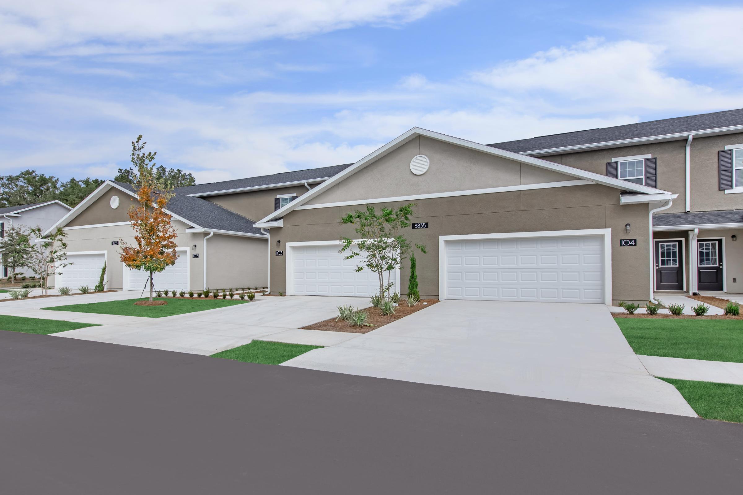 Townhome with private 2-car garage & driveway