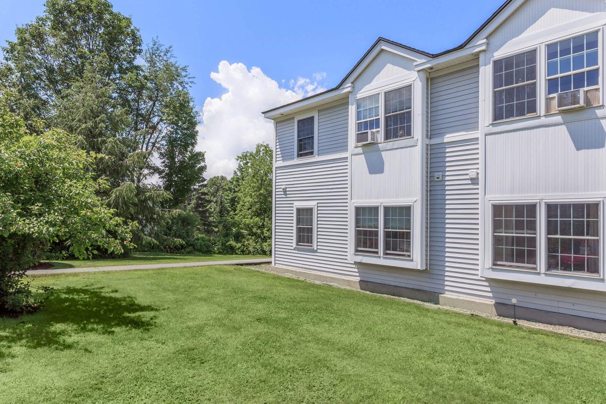 a large lawn in front of a house