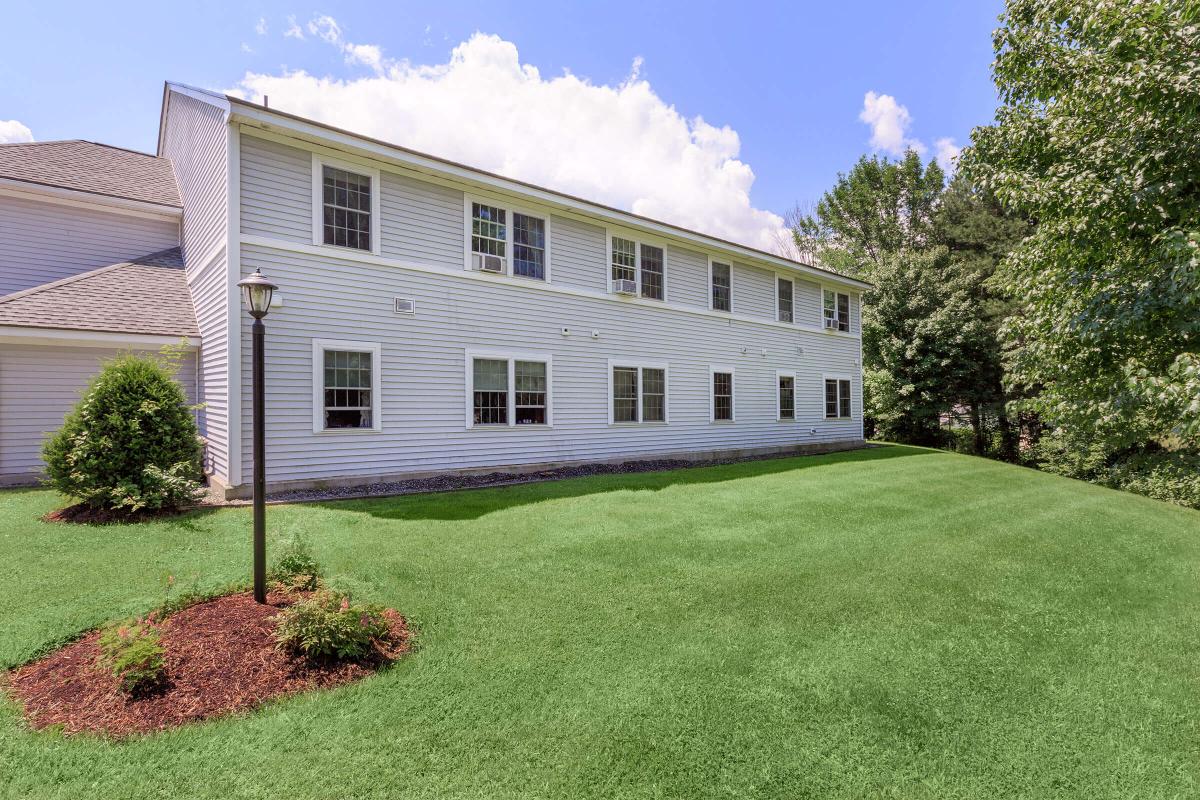 a large lawn in front of a house