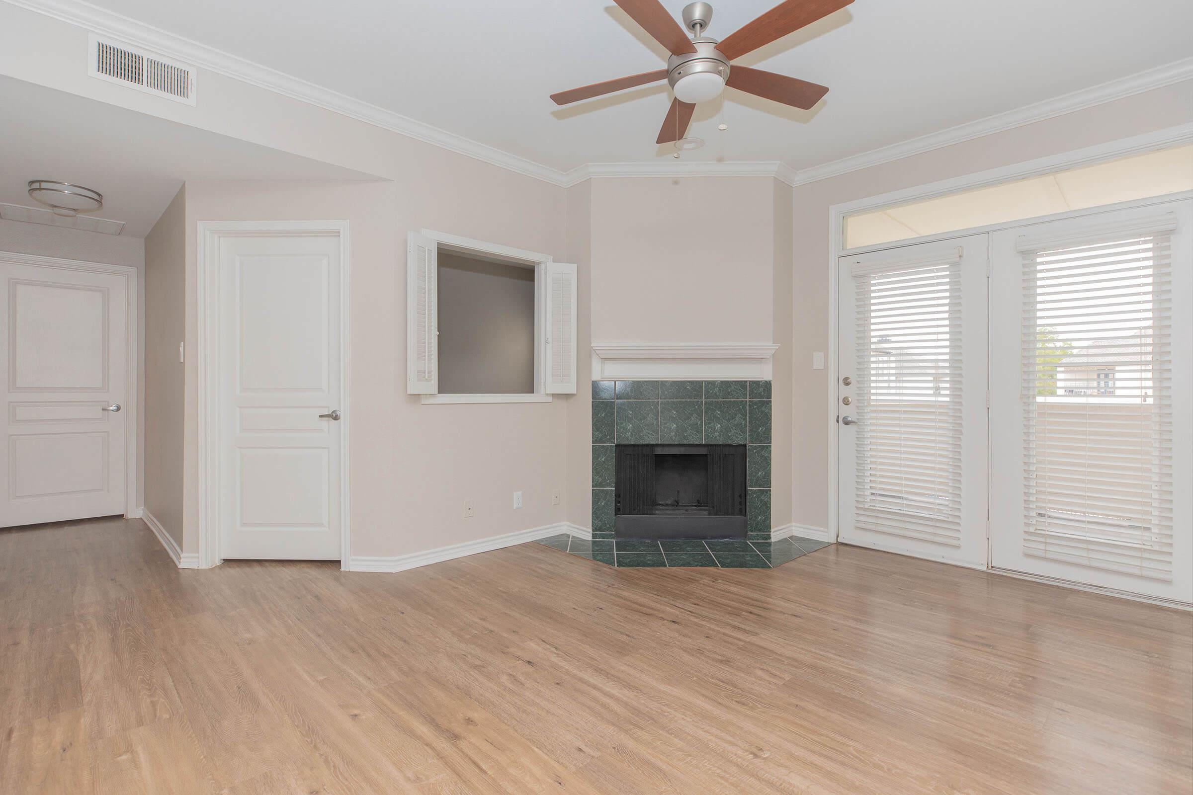 a kitchen with a wood floor