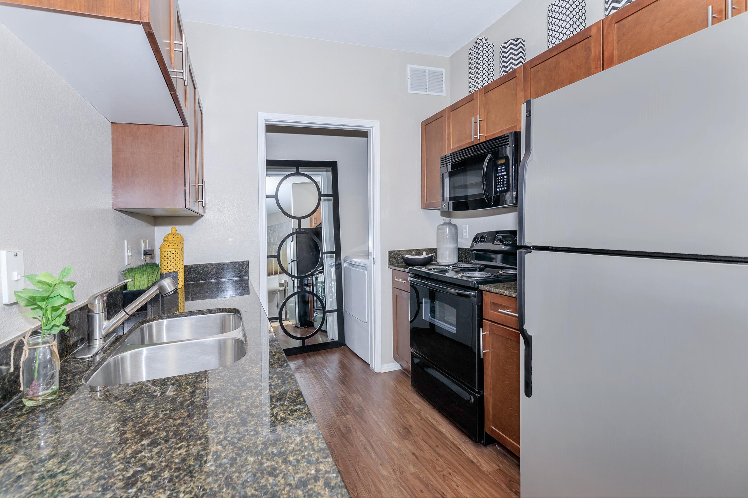 a stainless steel refrigerator in a kitchen