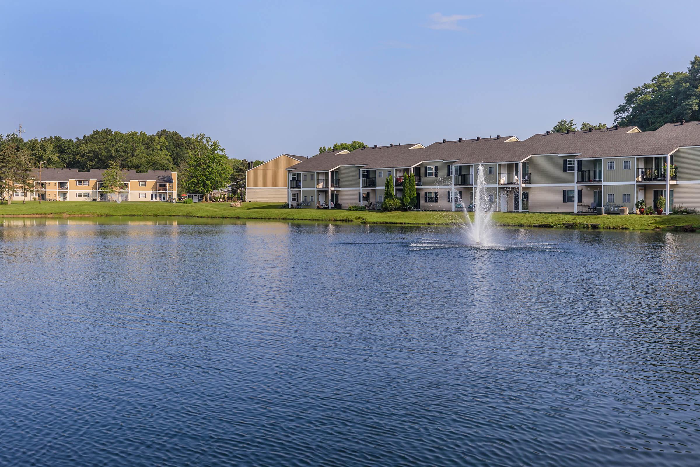 a building next to a body of water